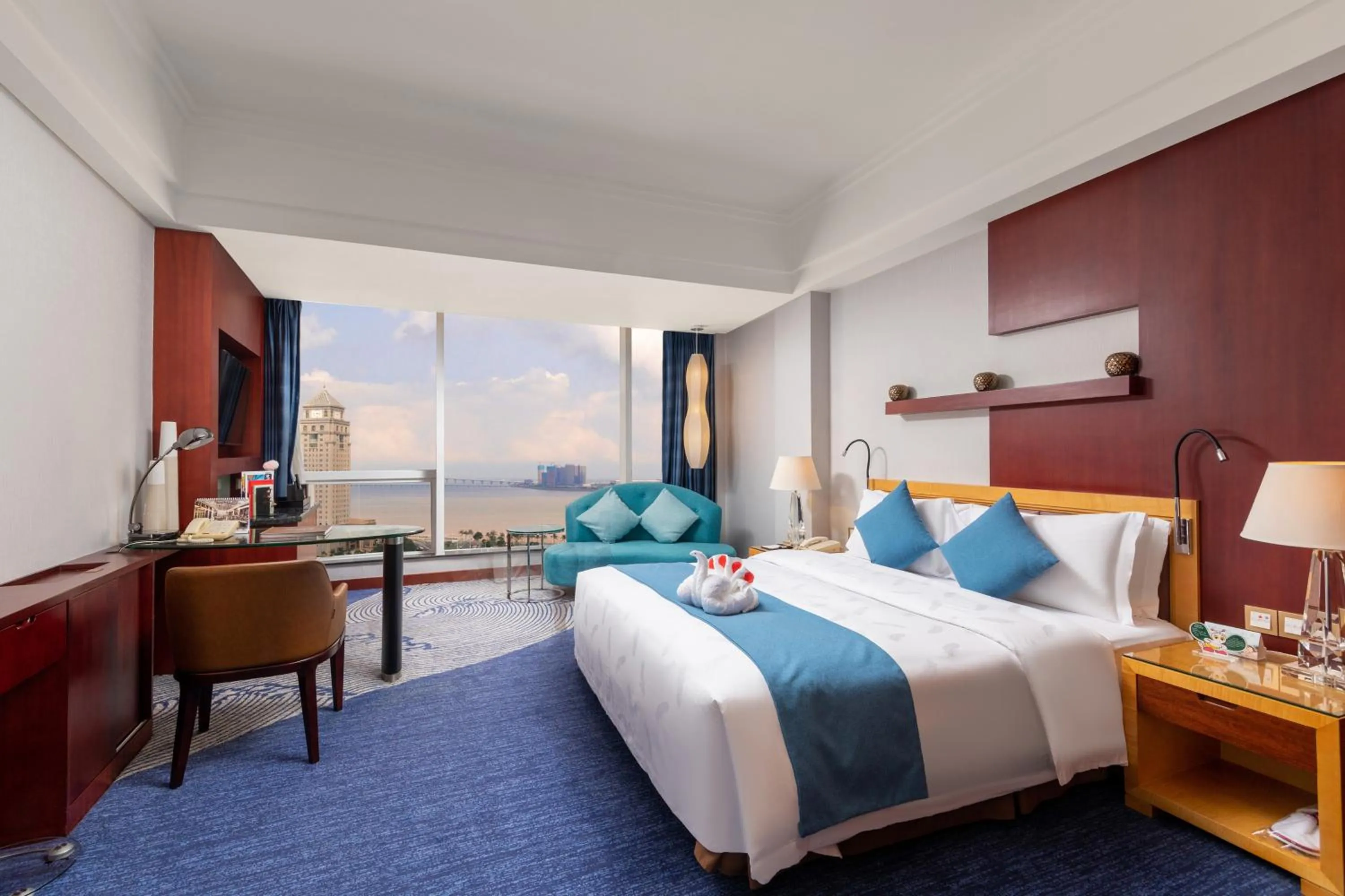 Bed in Zhuhai Charming Holiday Hotel