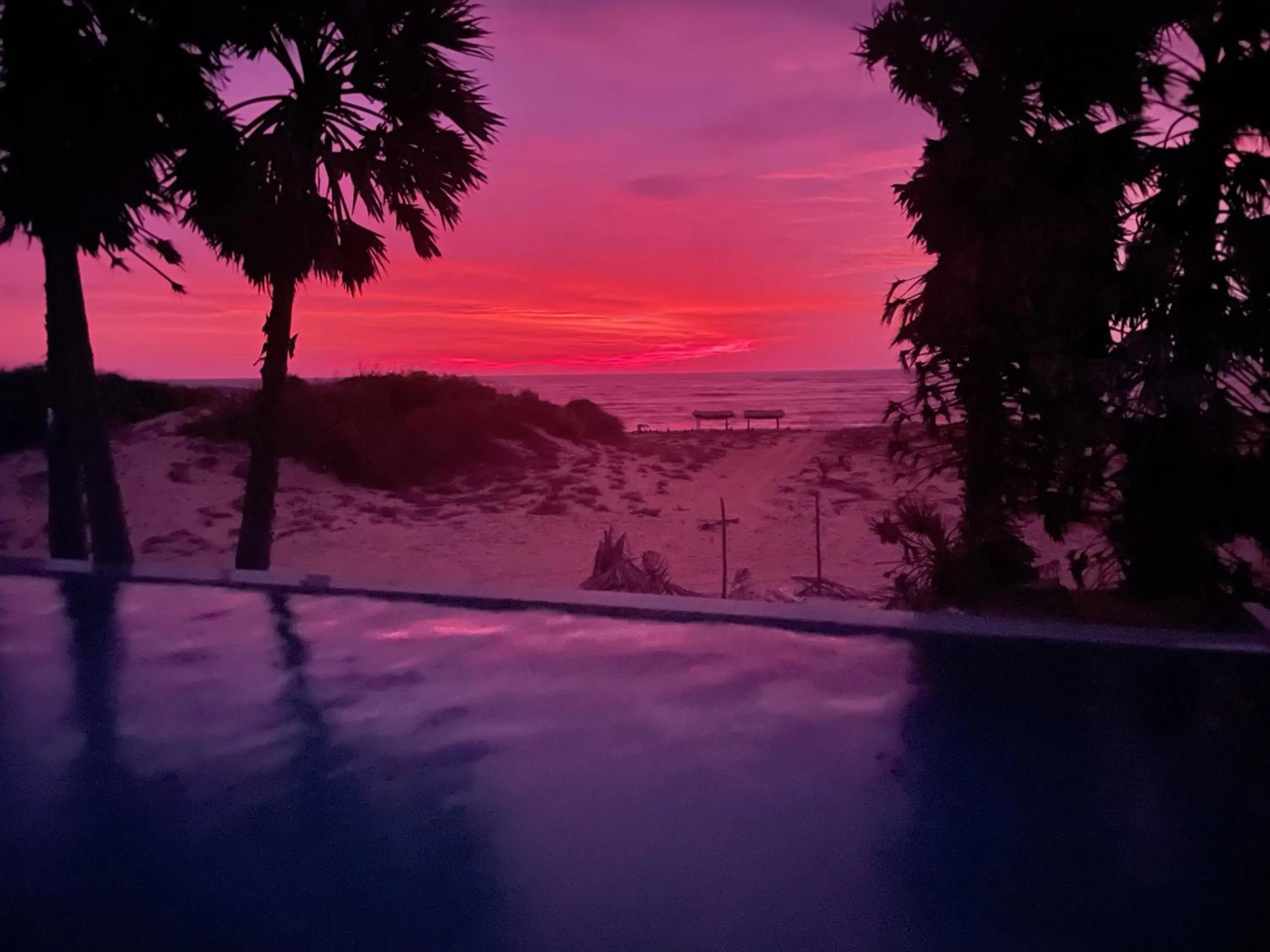 Swimming pool in Majestic Beach Retreat