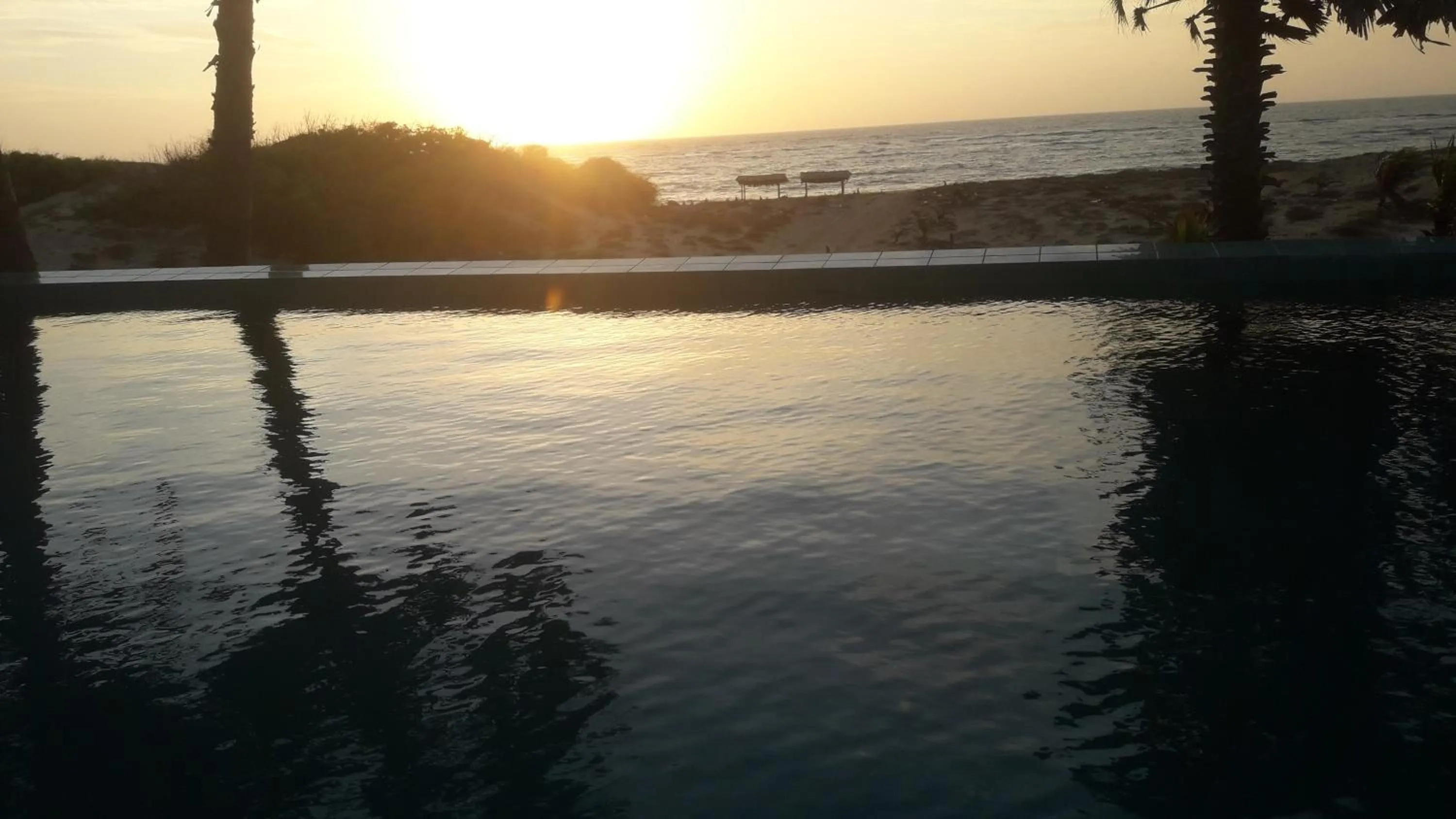 Swimming pool in Majestic Beach Retreat