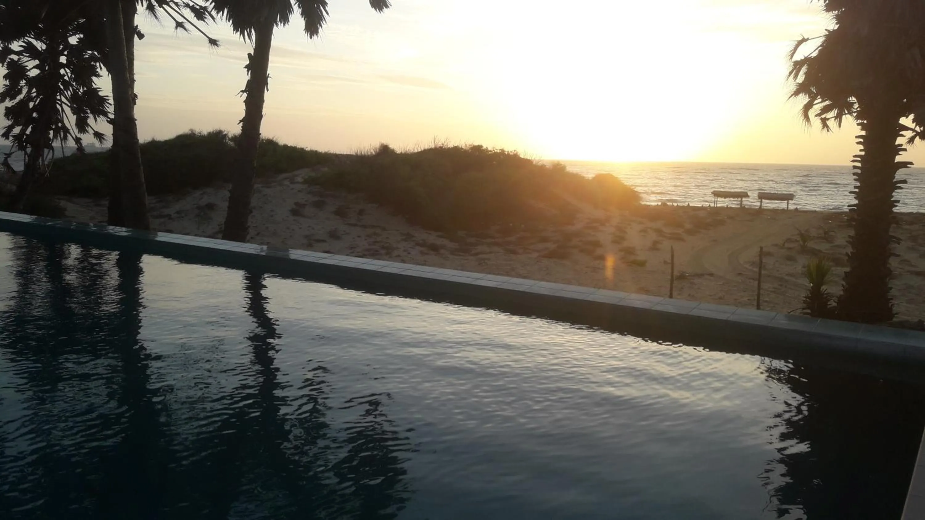 Swimming pool in Majestic Beach Retreat