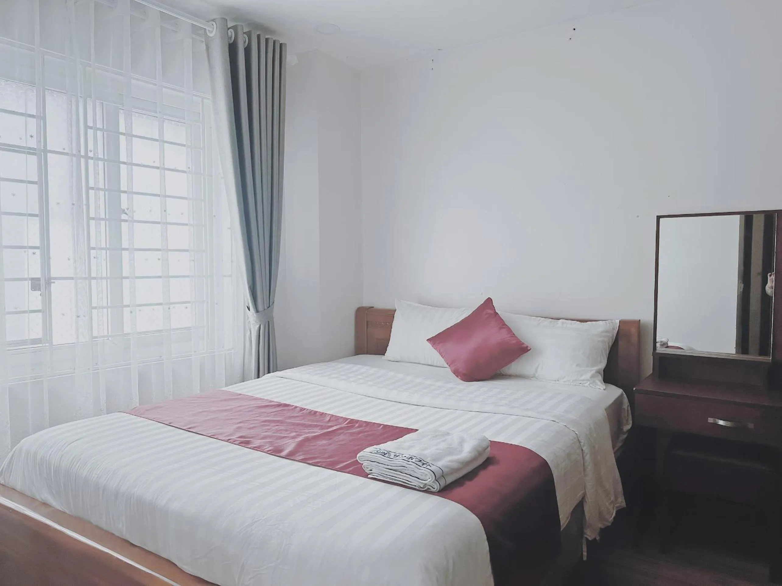 Bed in White Horse Dalat Hotel