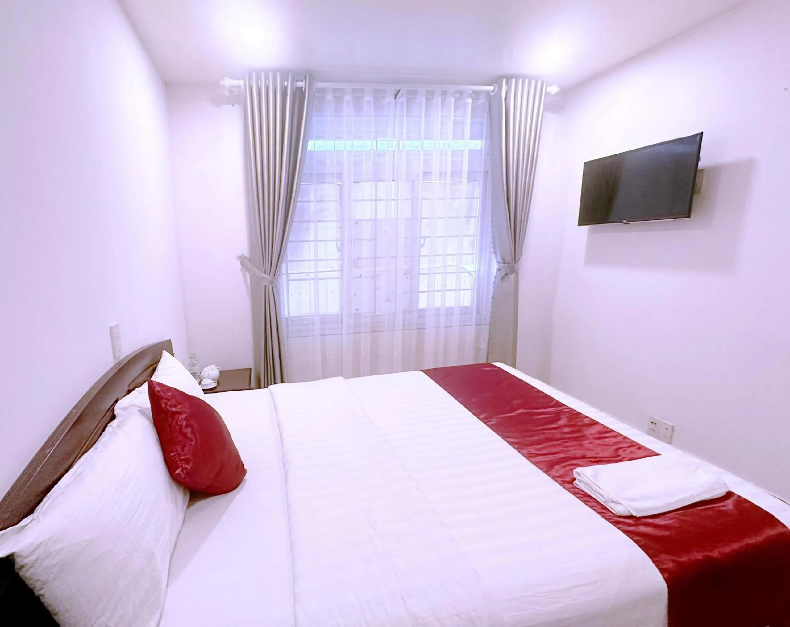 Bed in White Horse Dalat Hotel