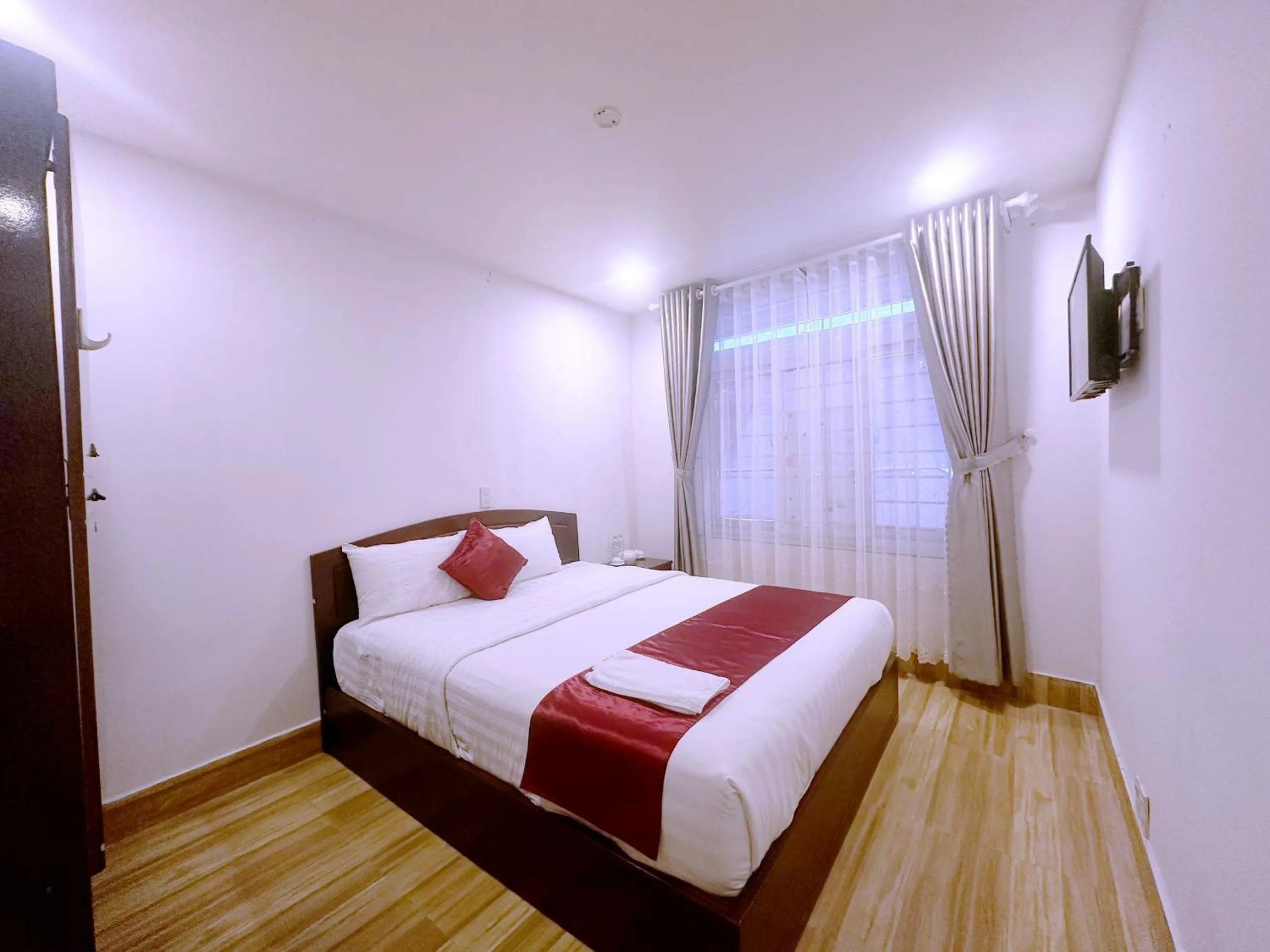 Bed in White Horse Dalat Hotel