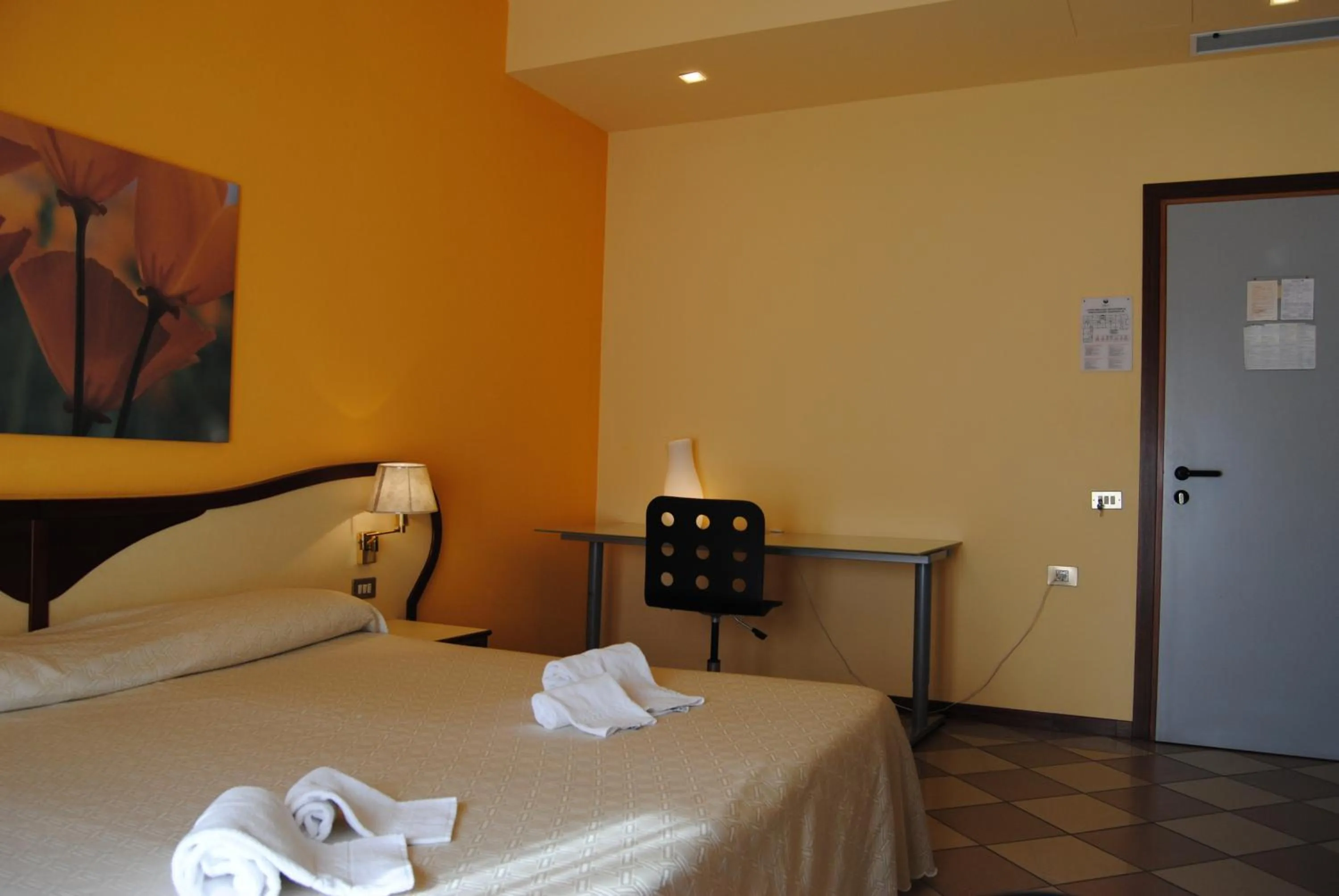 Bed in Hotel La Fenice