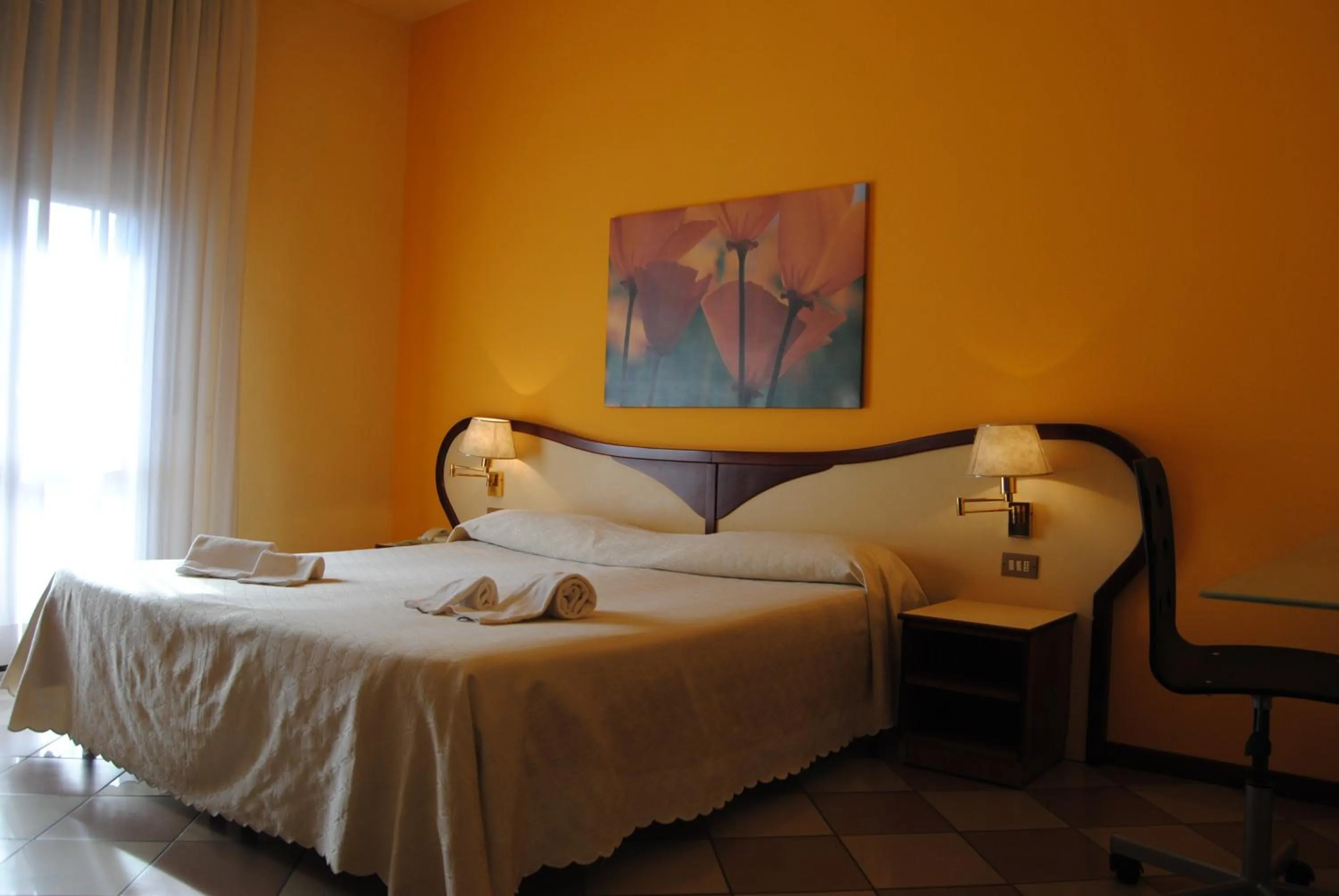 Bed in Hotel La Fenice