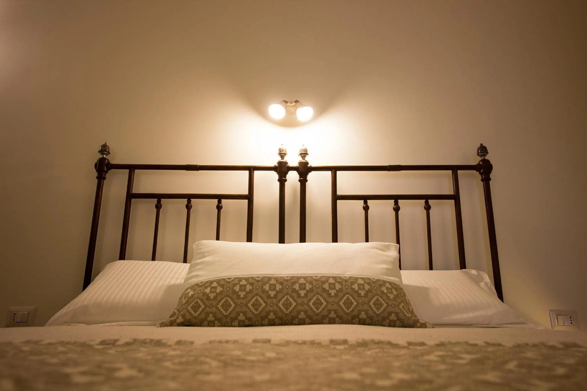 Decorative detail, Bed in Ai Sottani B&B Deluxe Suite