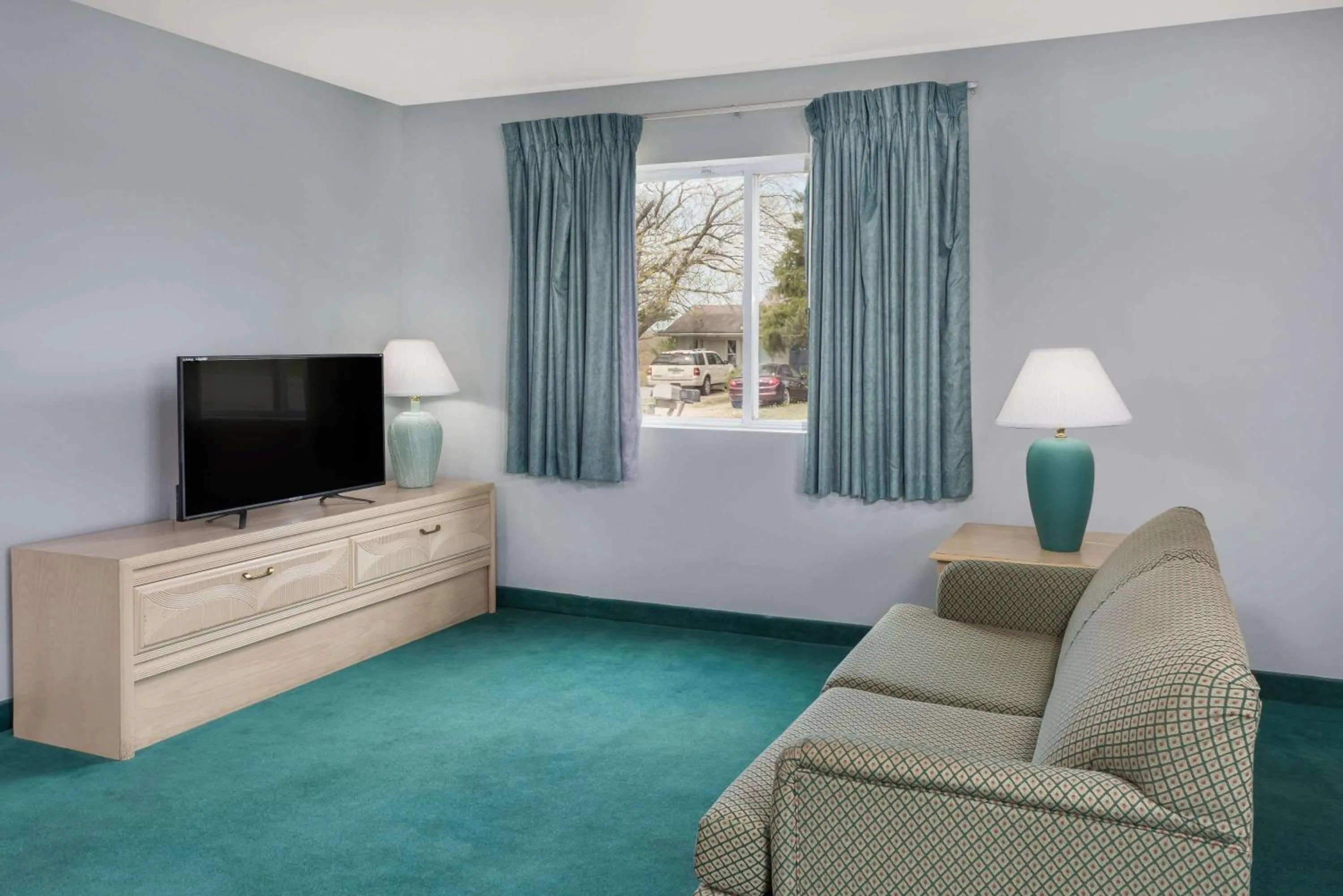 Living room in Days Inn by Wyndham Osage Beach Lake of the Ozarks