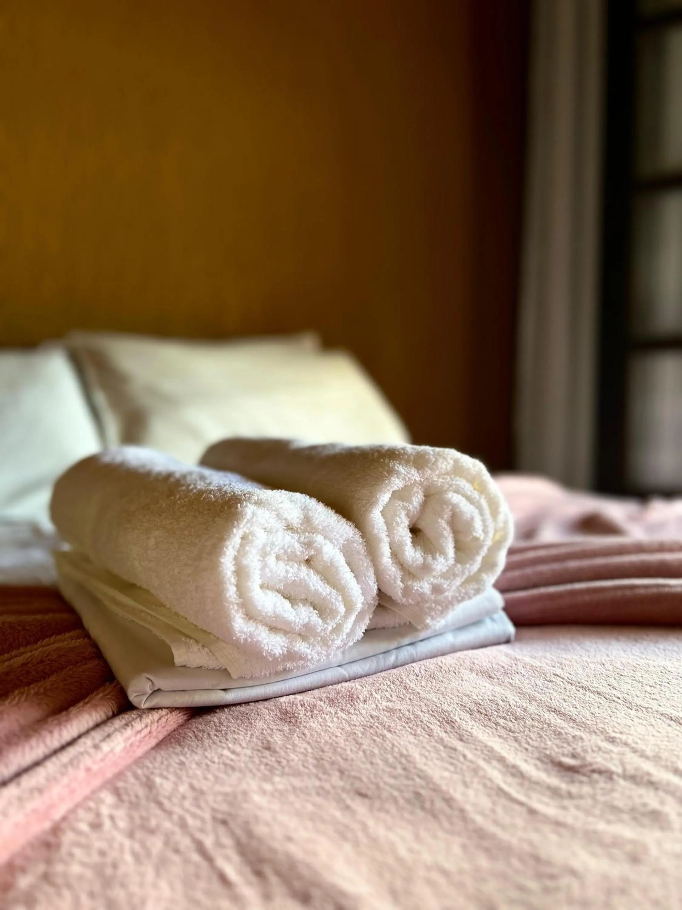 Bed in Bougainville Suítes