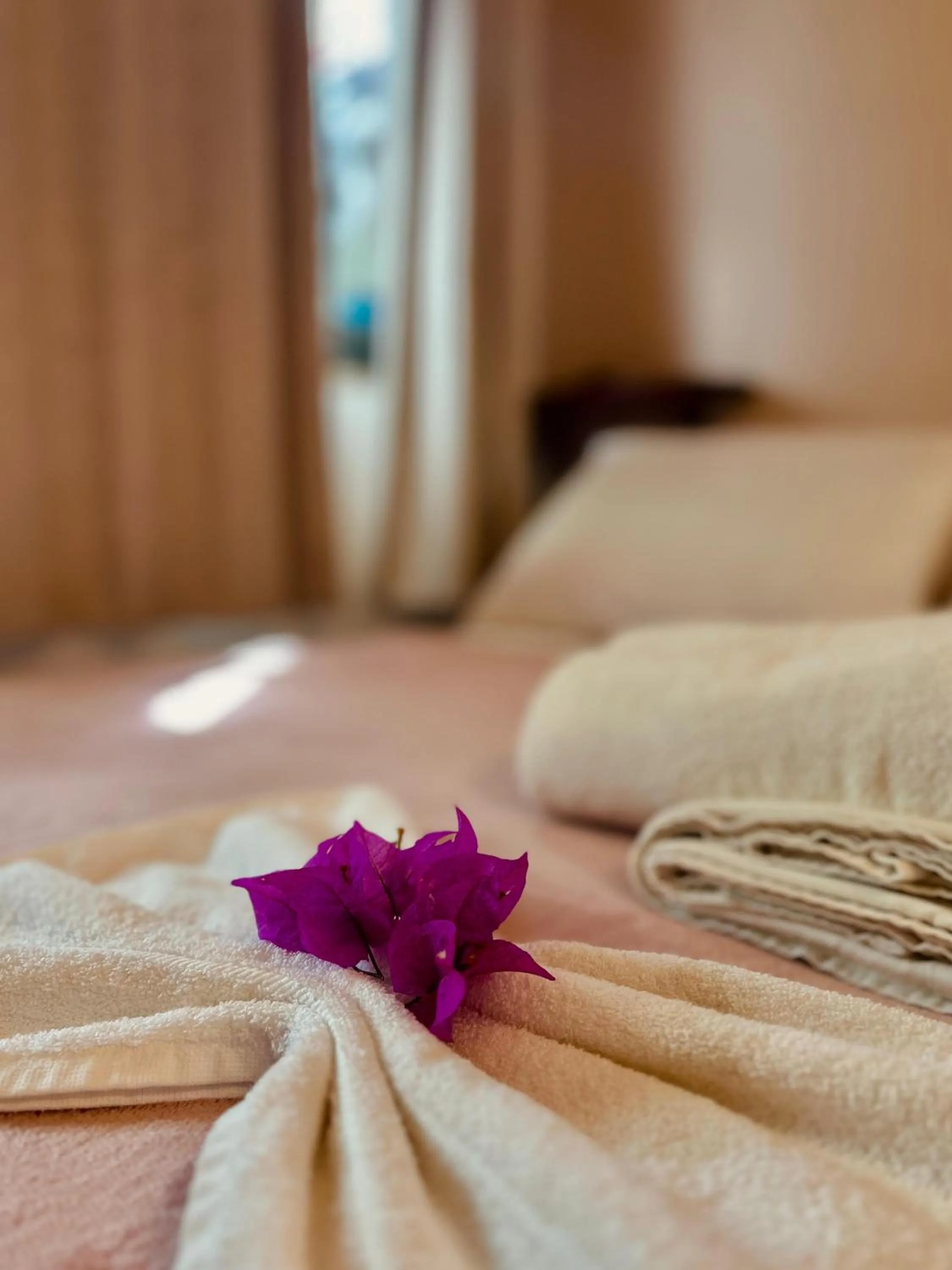 Bed in Bougainville Suítes