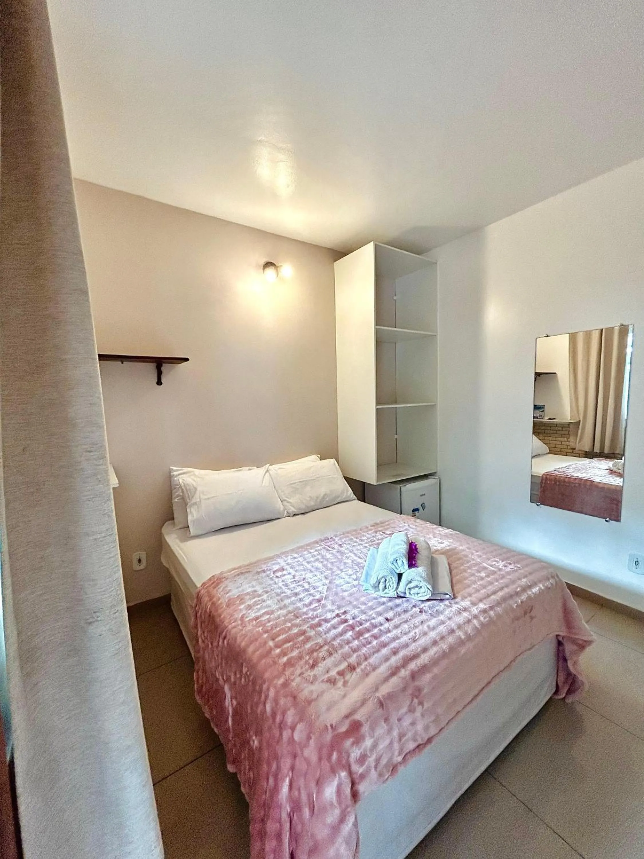 Bed in Bougainville Suítes