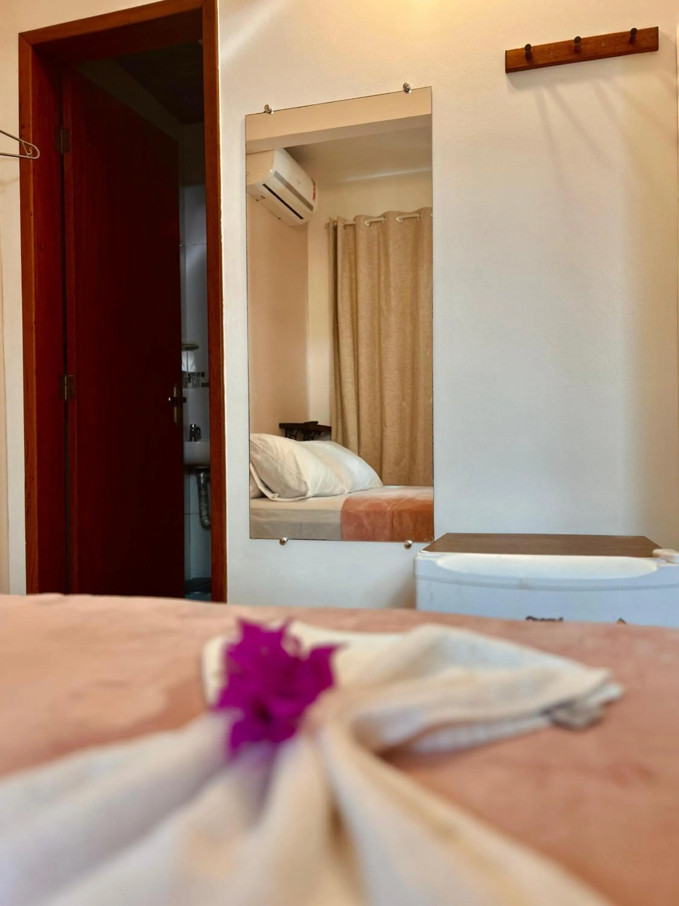 Bed in Bougainville Suítes