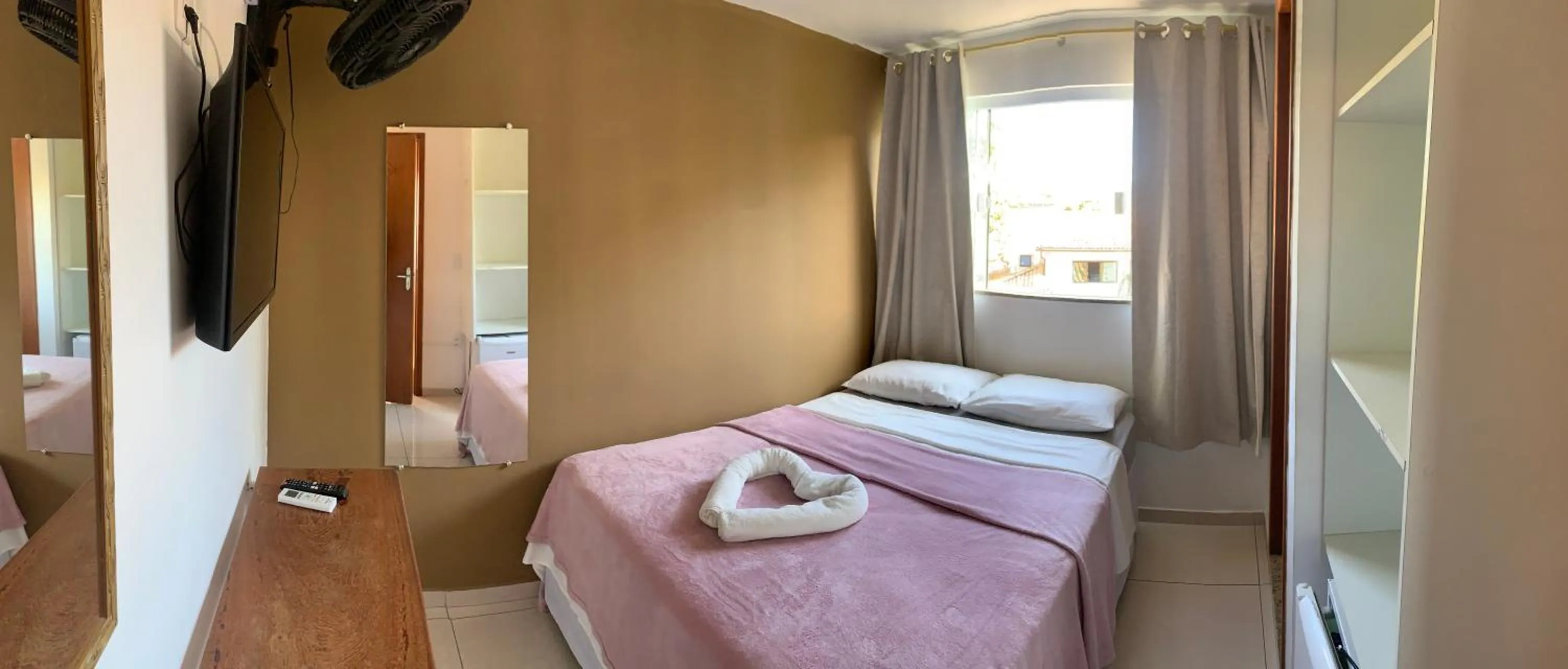 Bed in Bougainville Suítes