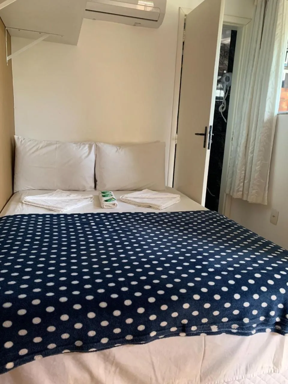 Bed in Bougainville Suítes