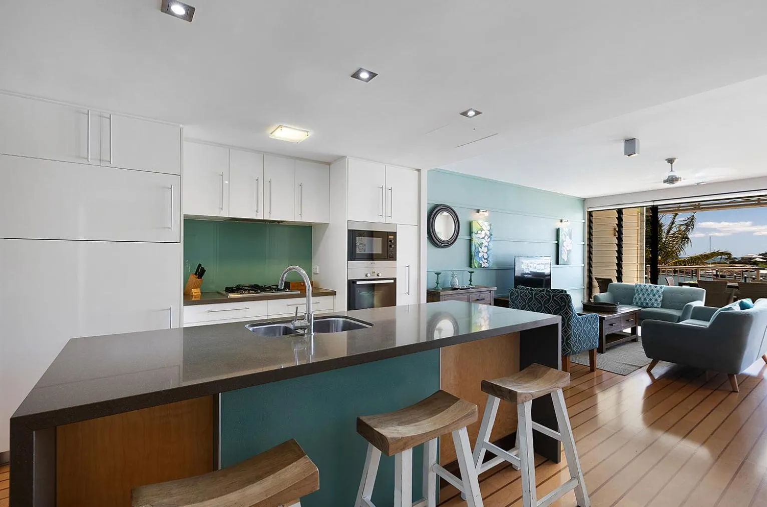 Communal lounge/ TV room in The Boathouse Apartments