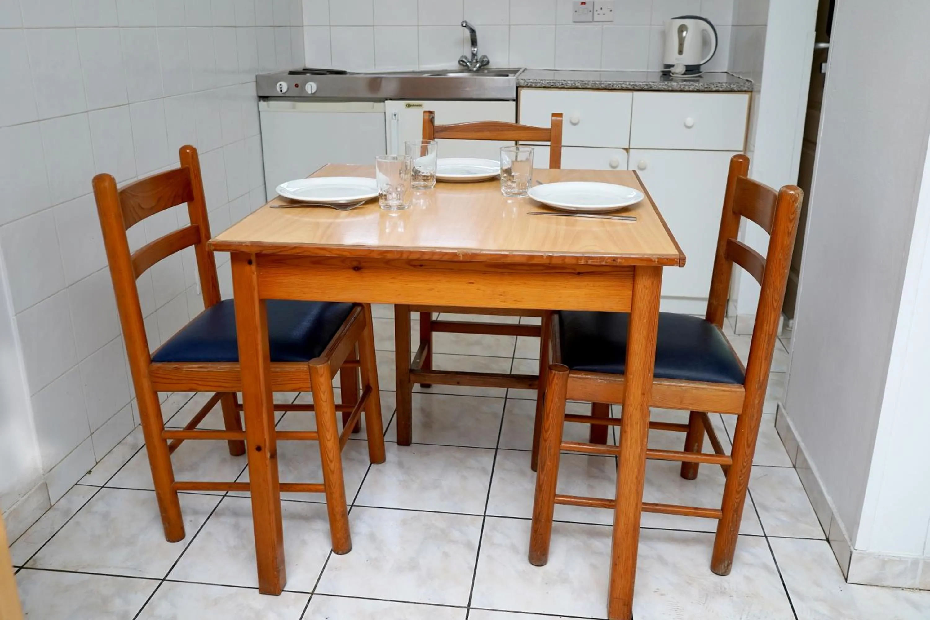 Kitchen or kitchenette in Green Bungalows Hotel Apartments - Residents Only