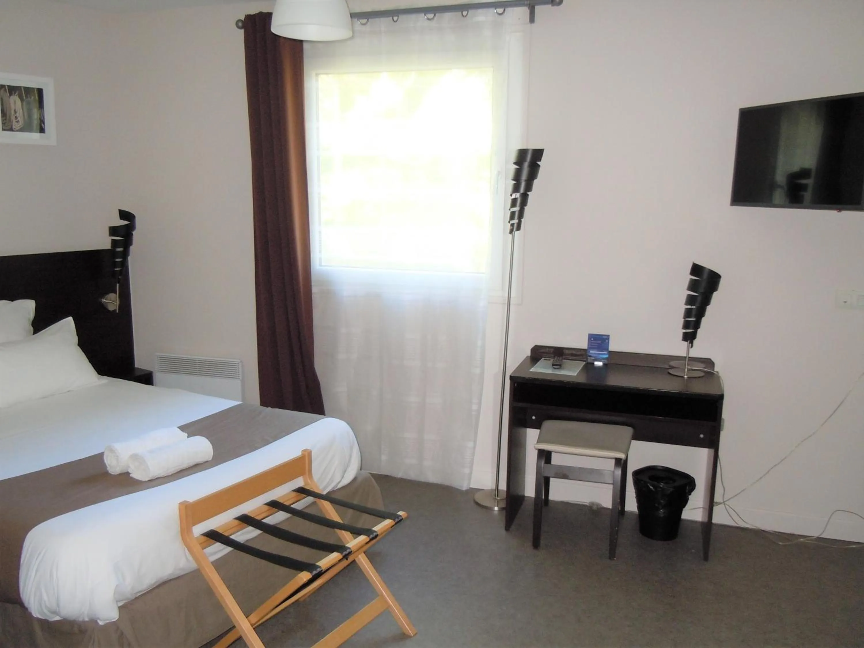 Bed in Sweet Home Appart'Hôtel Deauville Sud