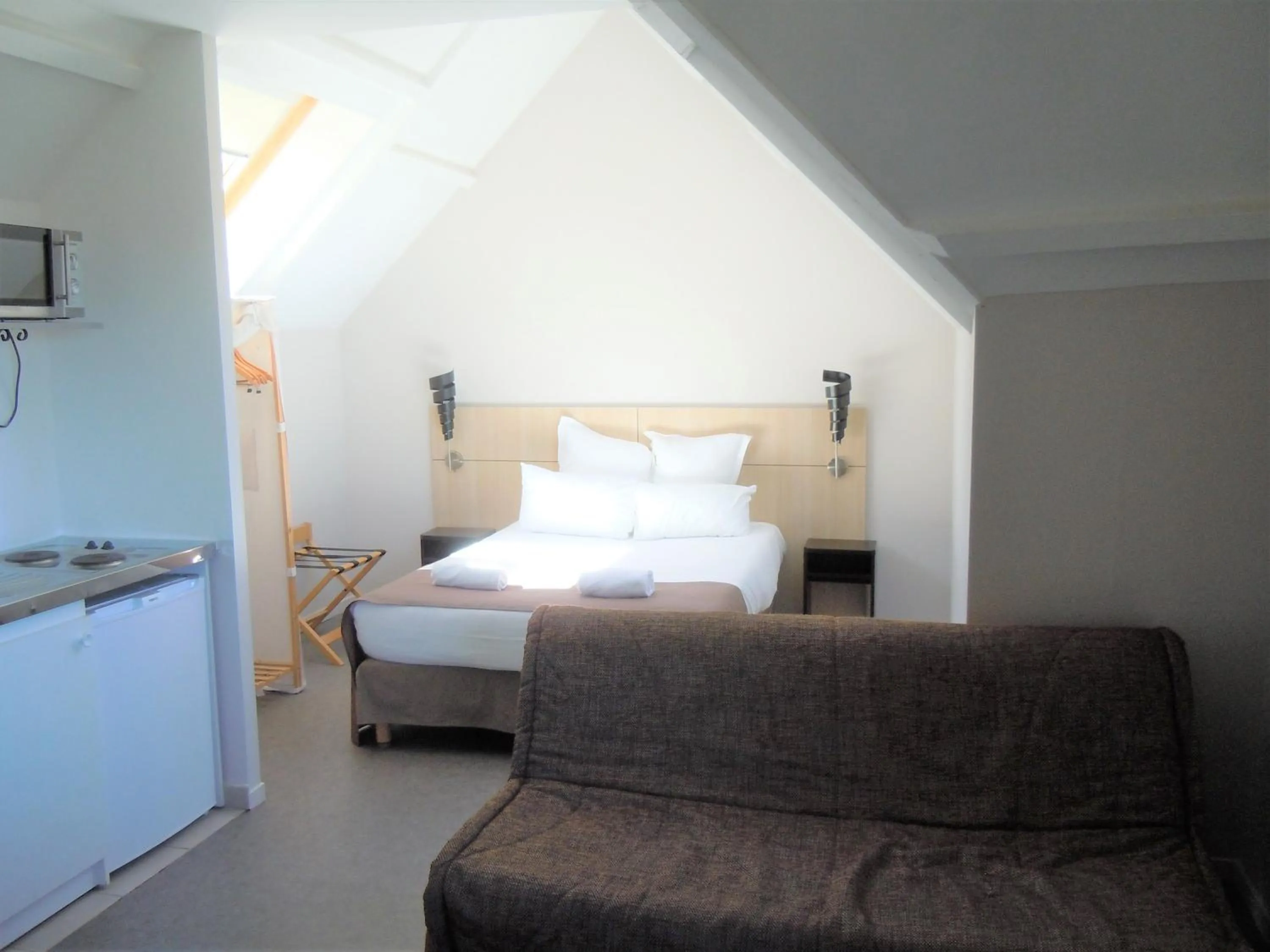 Bed in Sweet Home Appart'Hôtel Deauville Sud