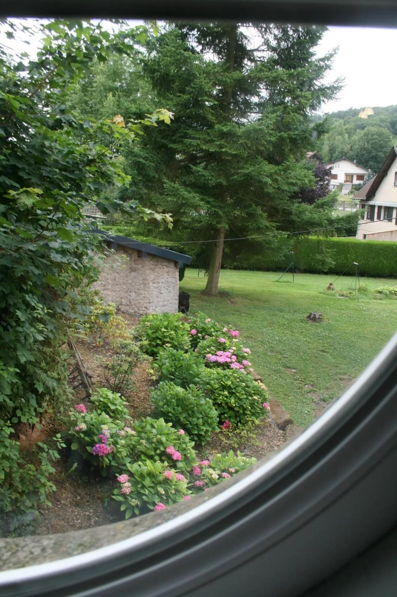 Garden view in Logis Hôtel DOMAINE du MOULIN