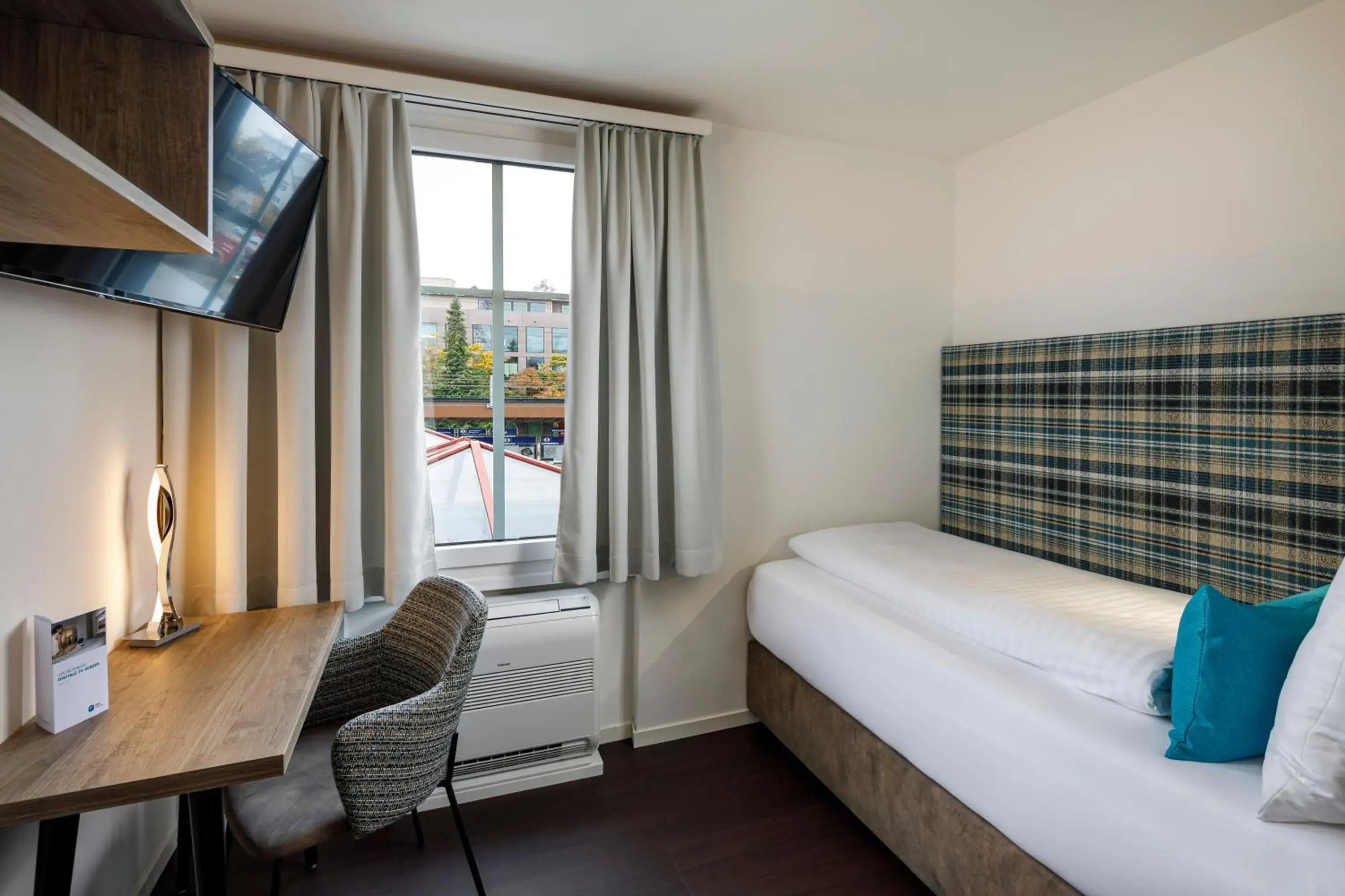 Economy Single Room in Hotel Schweizerhof Economy Single Room in Hotel Schweizerhof