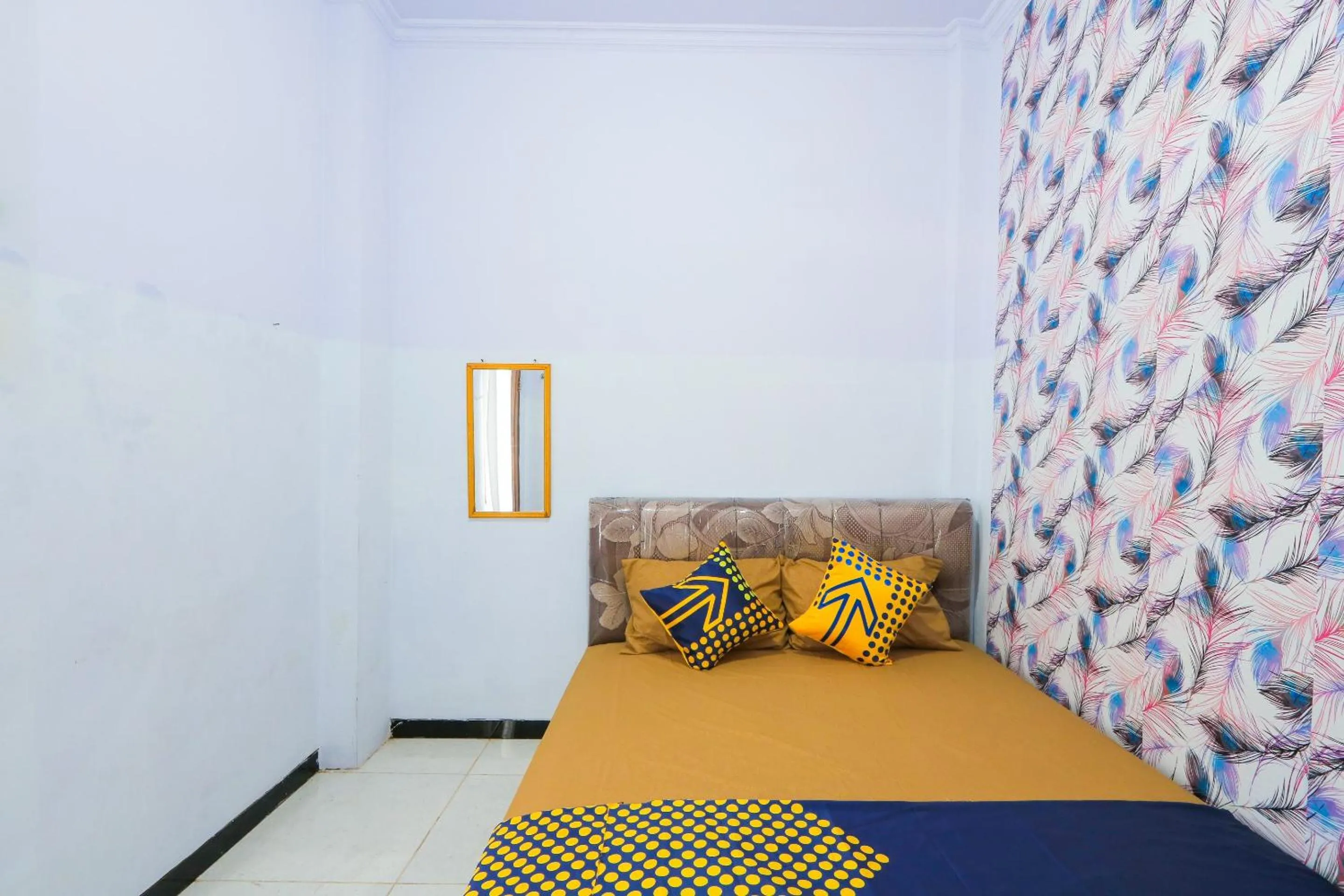 Bedroom in OYO 2497 Pesona Guest House