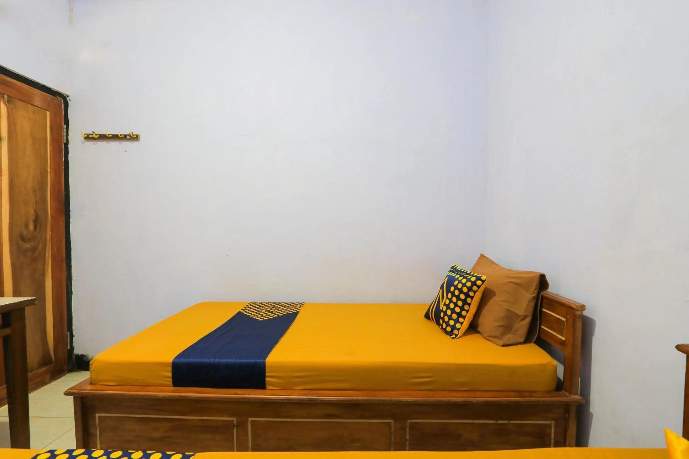 Bedroom in OYO 2497 Pesona Guest House