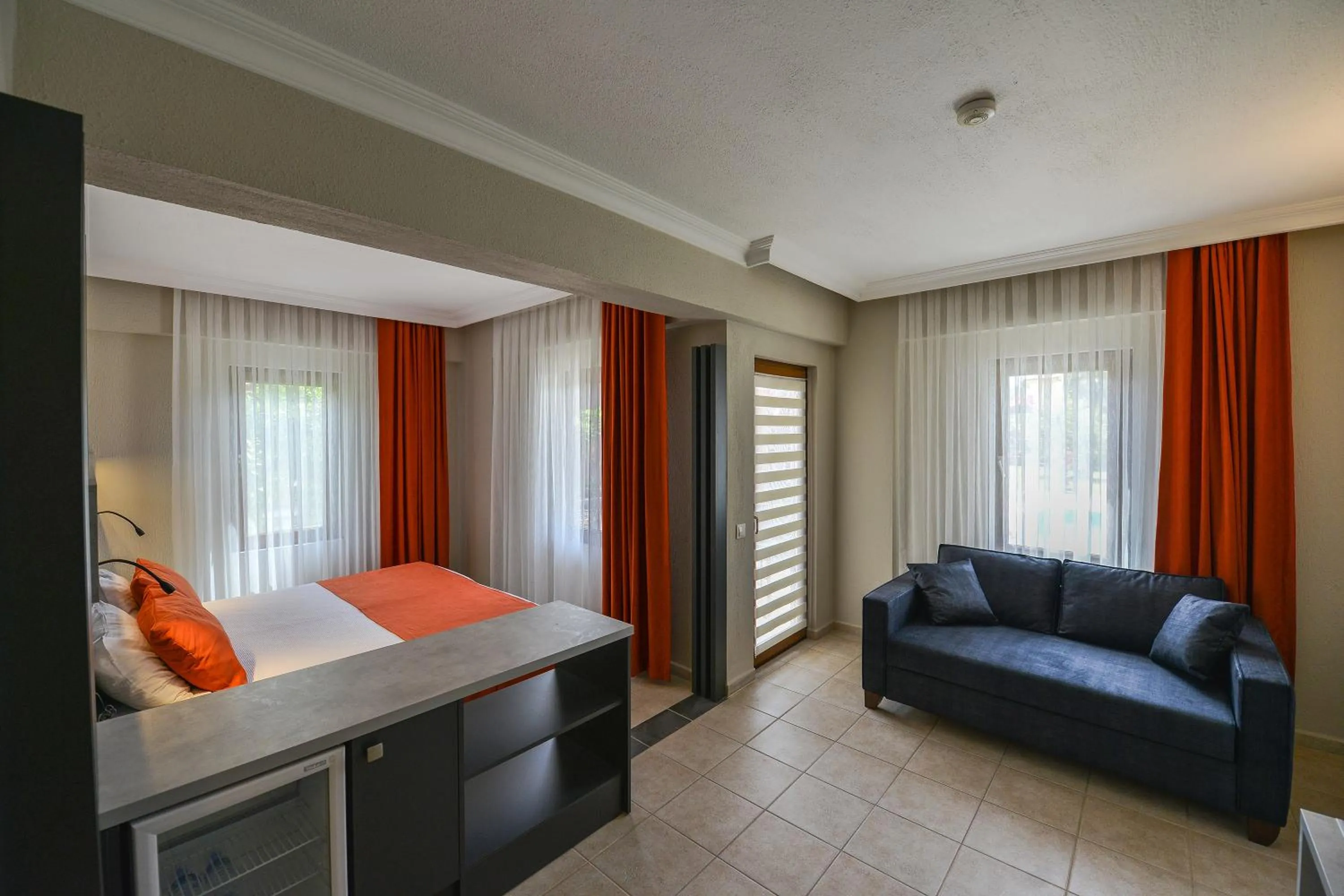 Living room, Bed in Gocek Arion Hotel