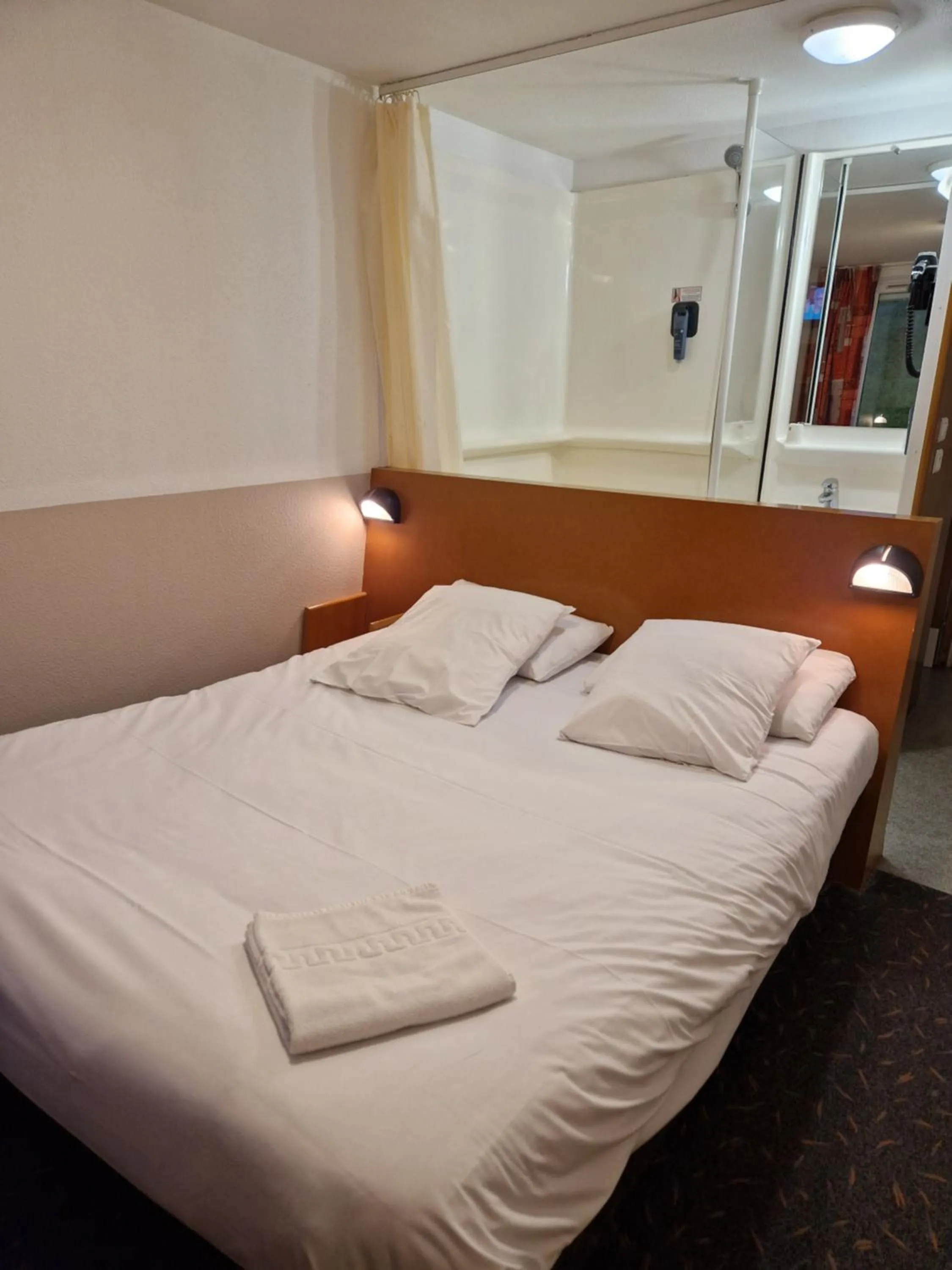 Bed in Quick Palace Vannes