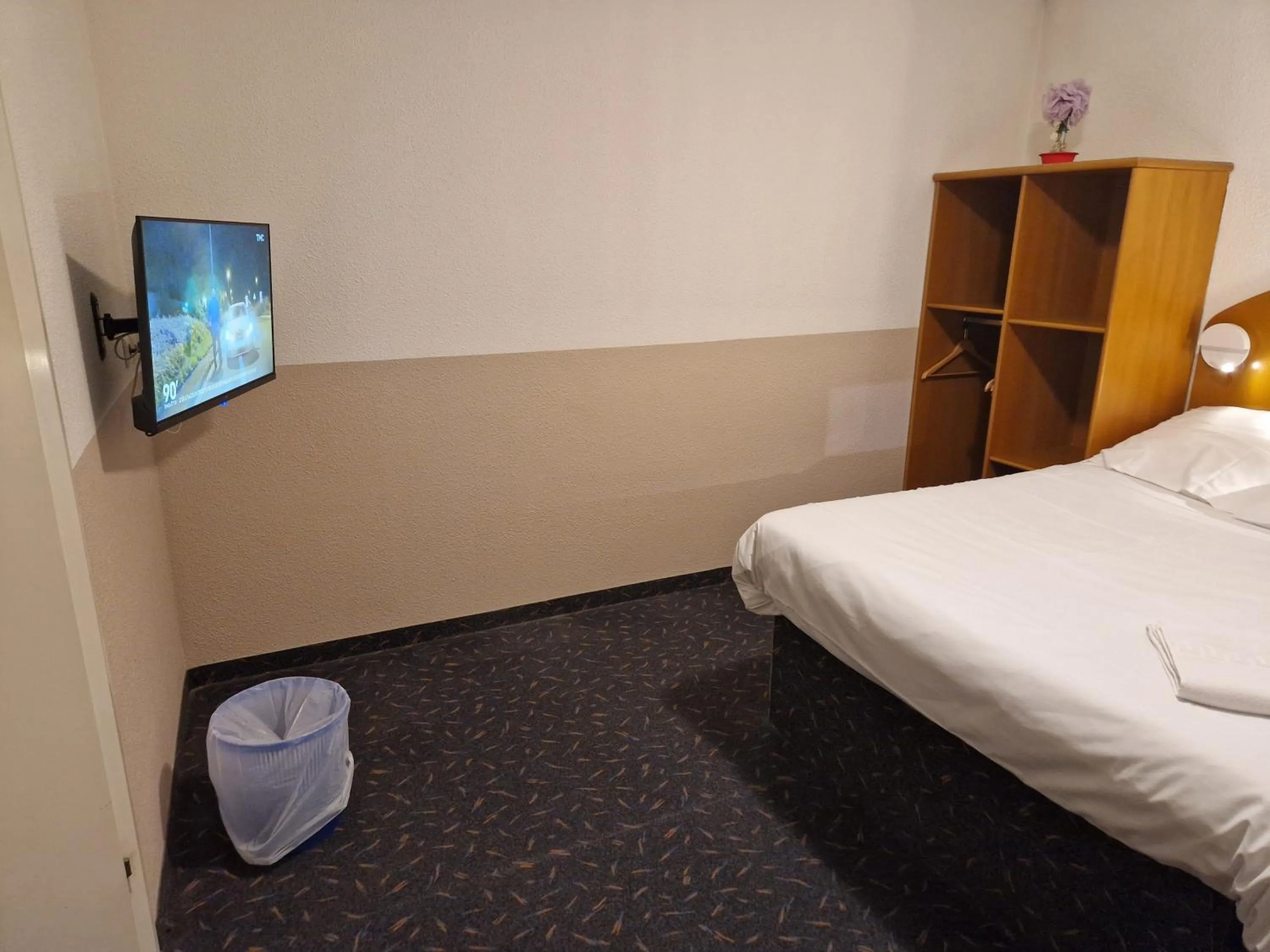 Bed in Quick Palace Vannes