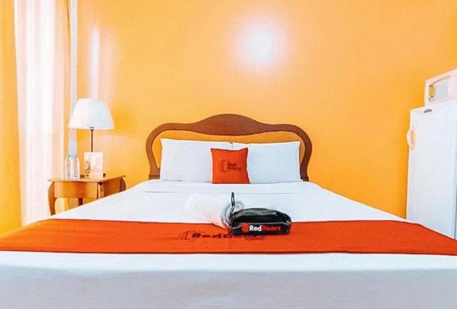 Bed in RedDoorz at Bel Air Soho Suites Makati City