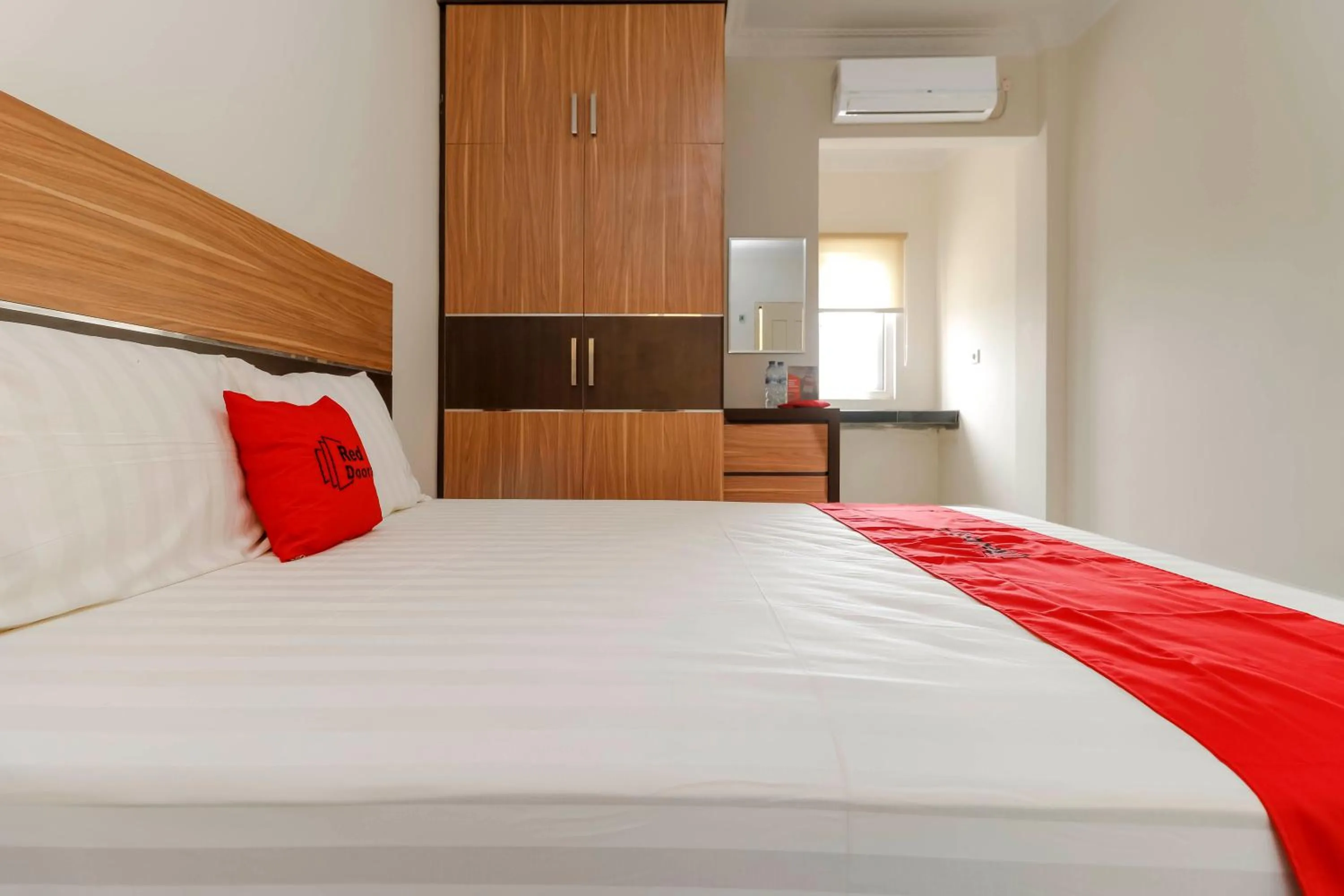 Bedroom, Bed in RedDoorz Plus near Palembang Square Mall