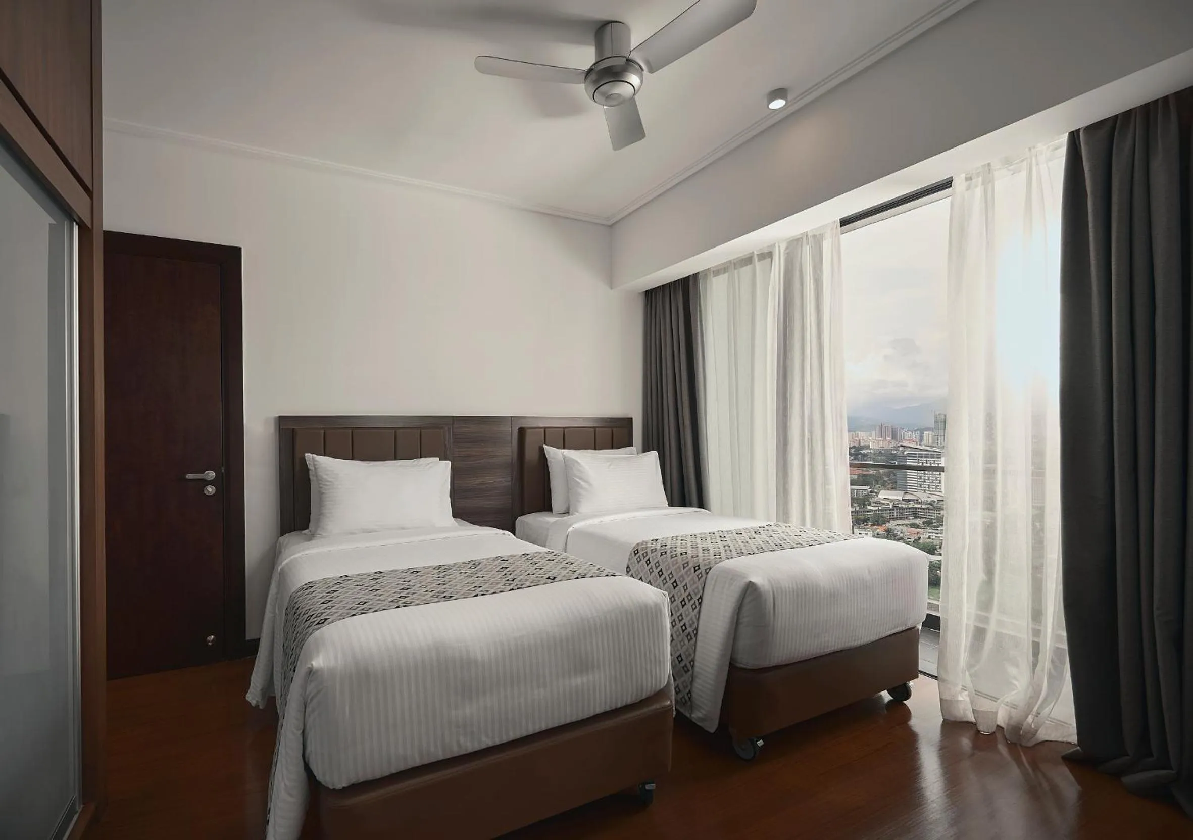 Bed in TRILLION SUITES by SLG