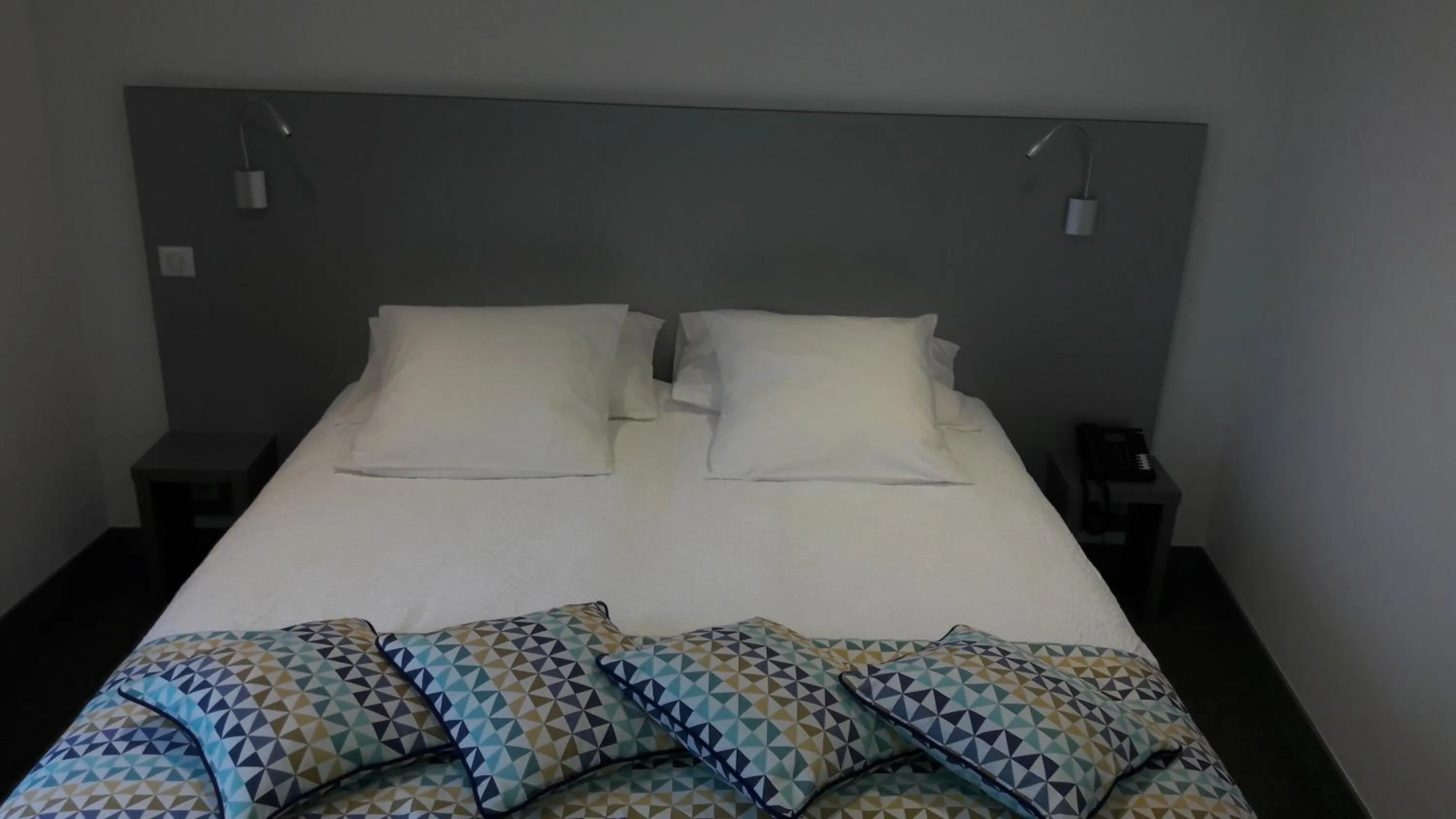 Bed in Hotel L'alpin