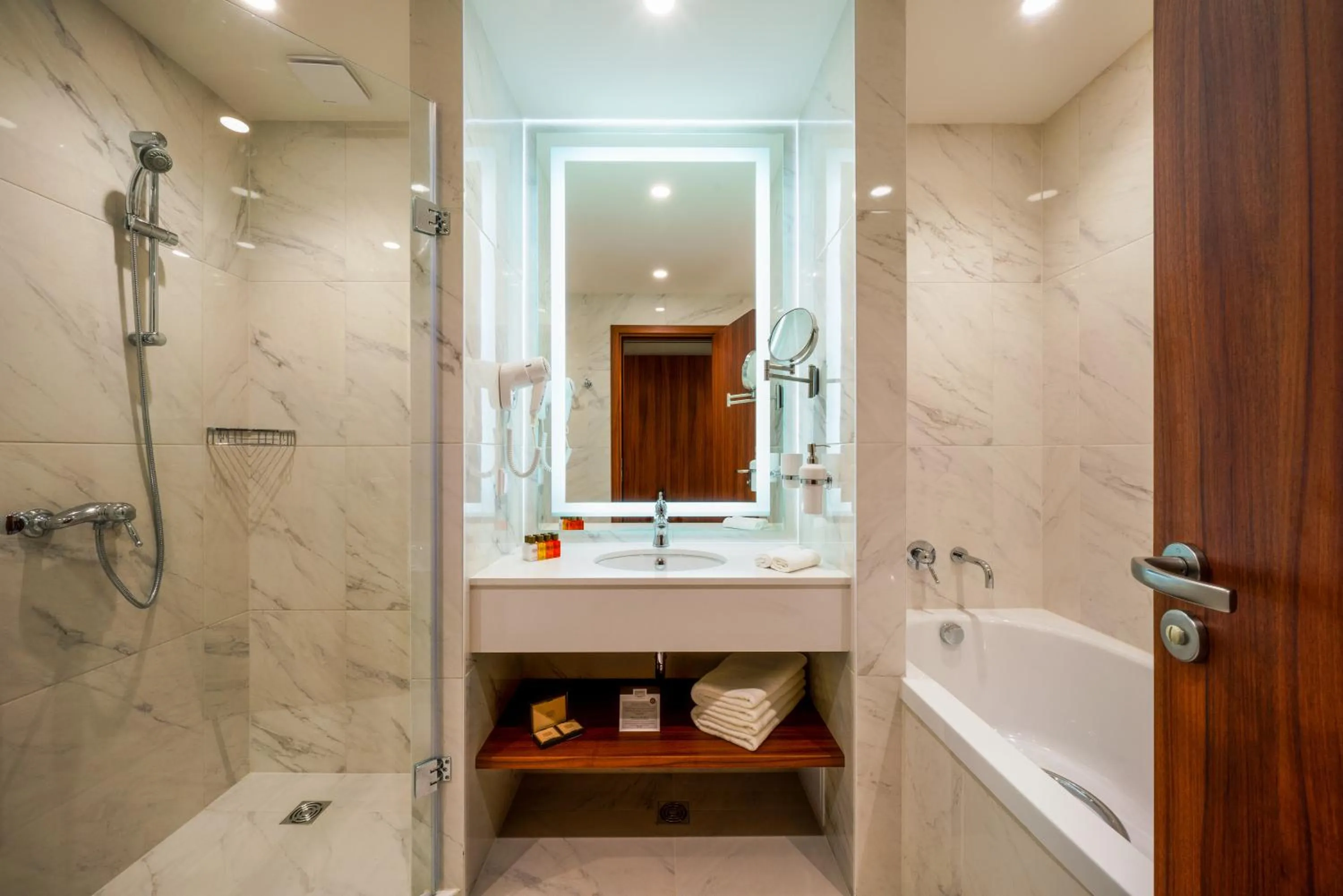 Bathroom in Astor Garden Hotel