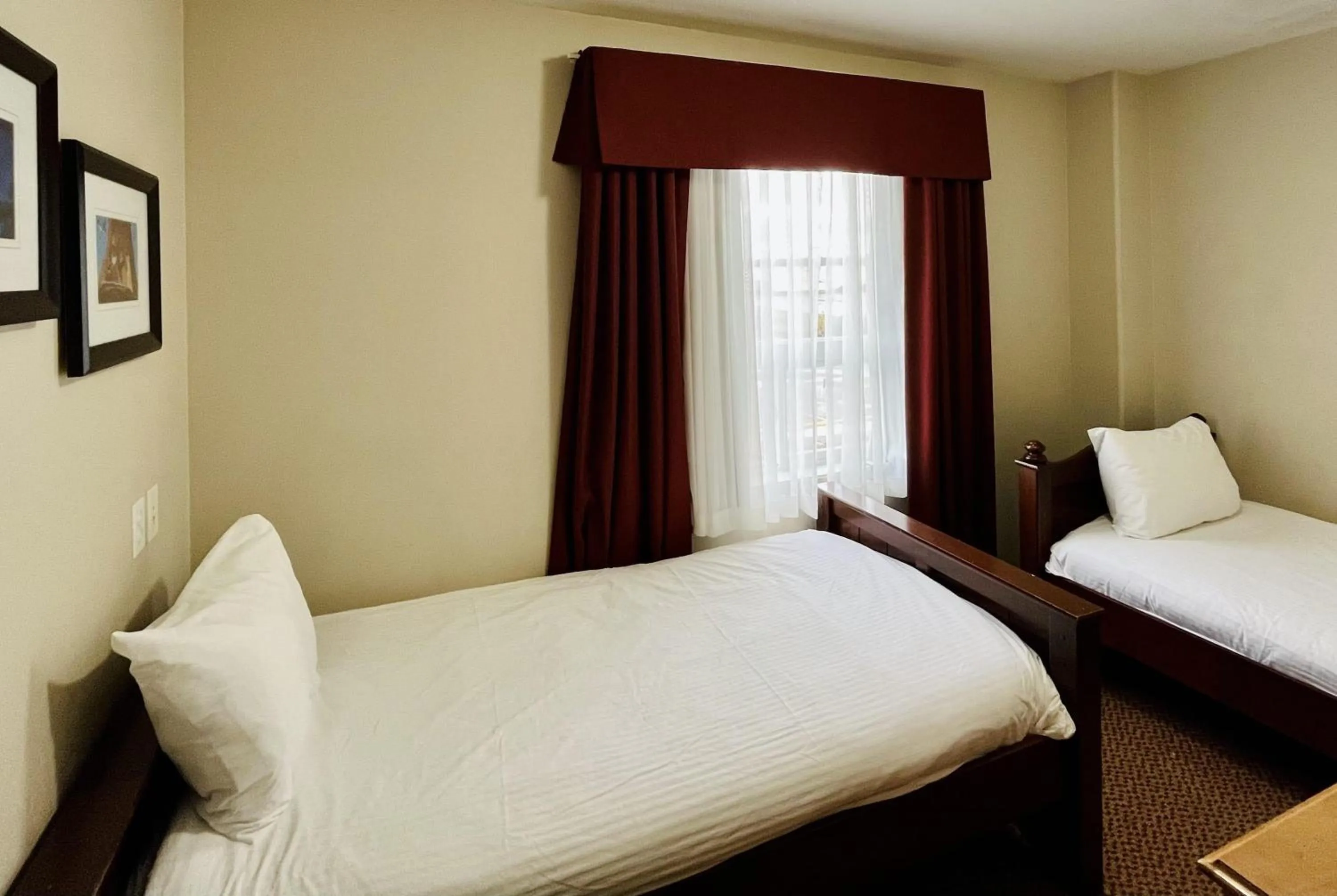 Photo of the whole room, Bed in Super 8 by Wyndham Grande Prairie