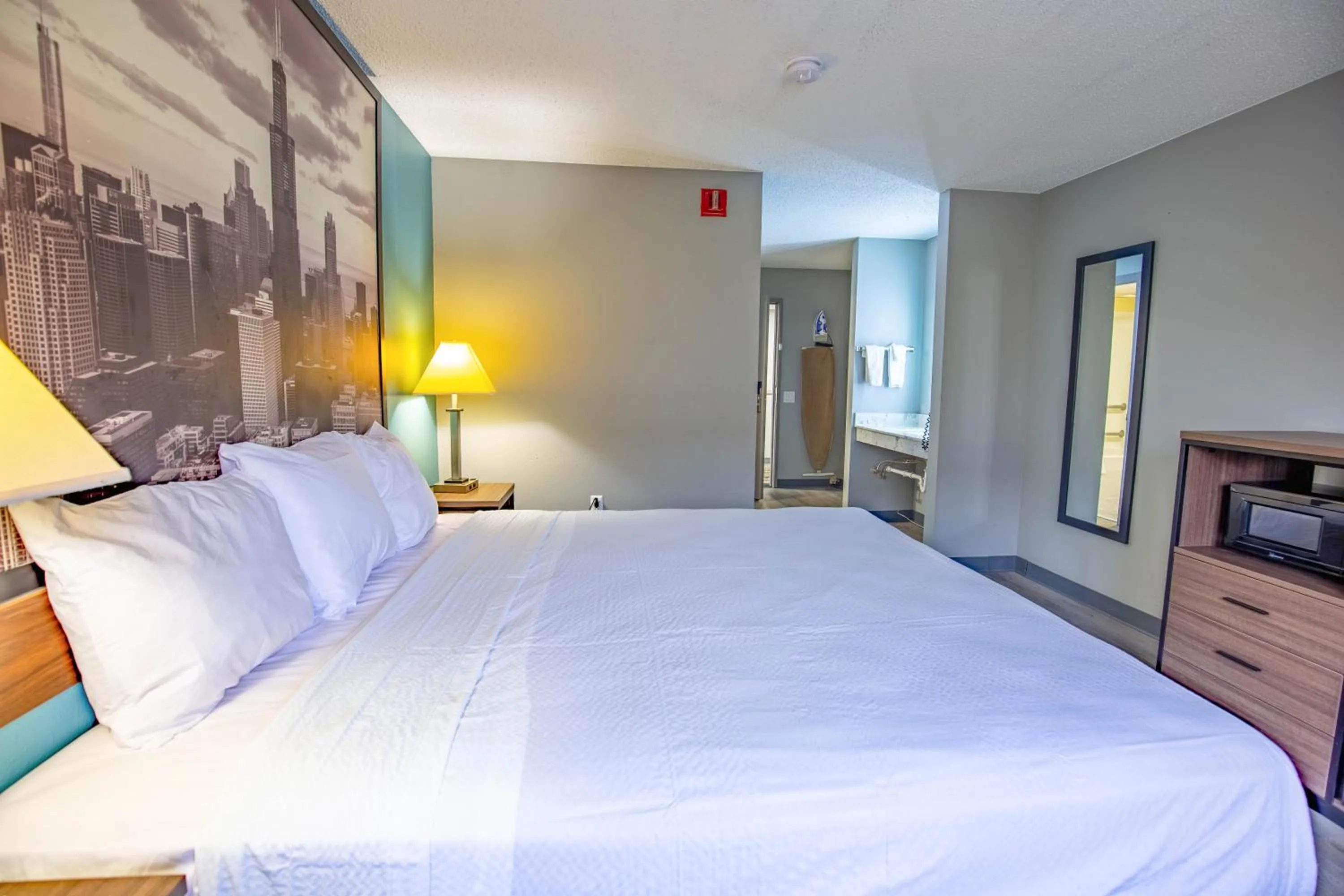 Bed in Super 8 by Wyndham Rockford I-90 Casino District