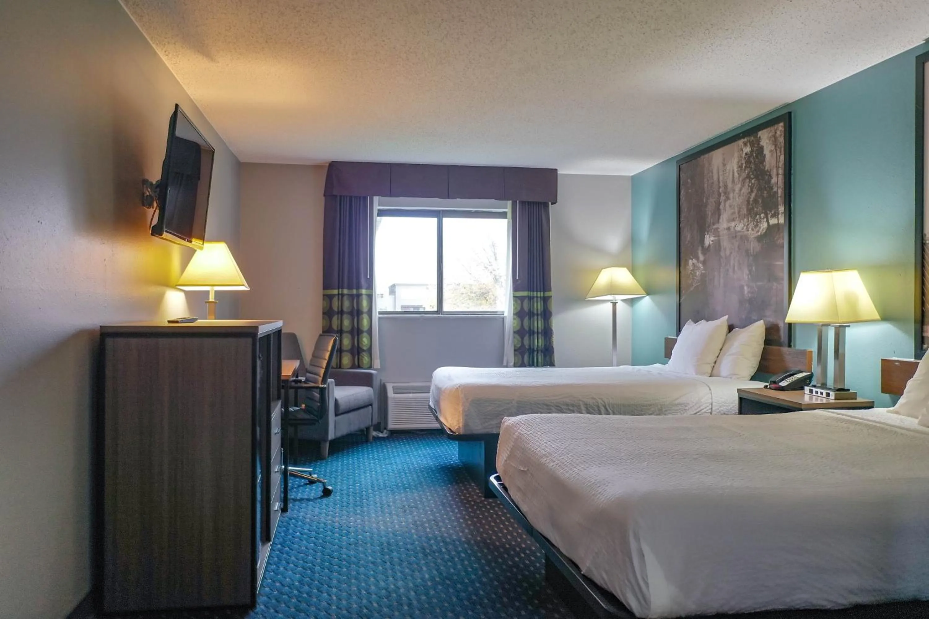 Bed in Super 8 by Wyndham Rockford I-90 Casino District