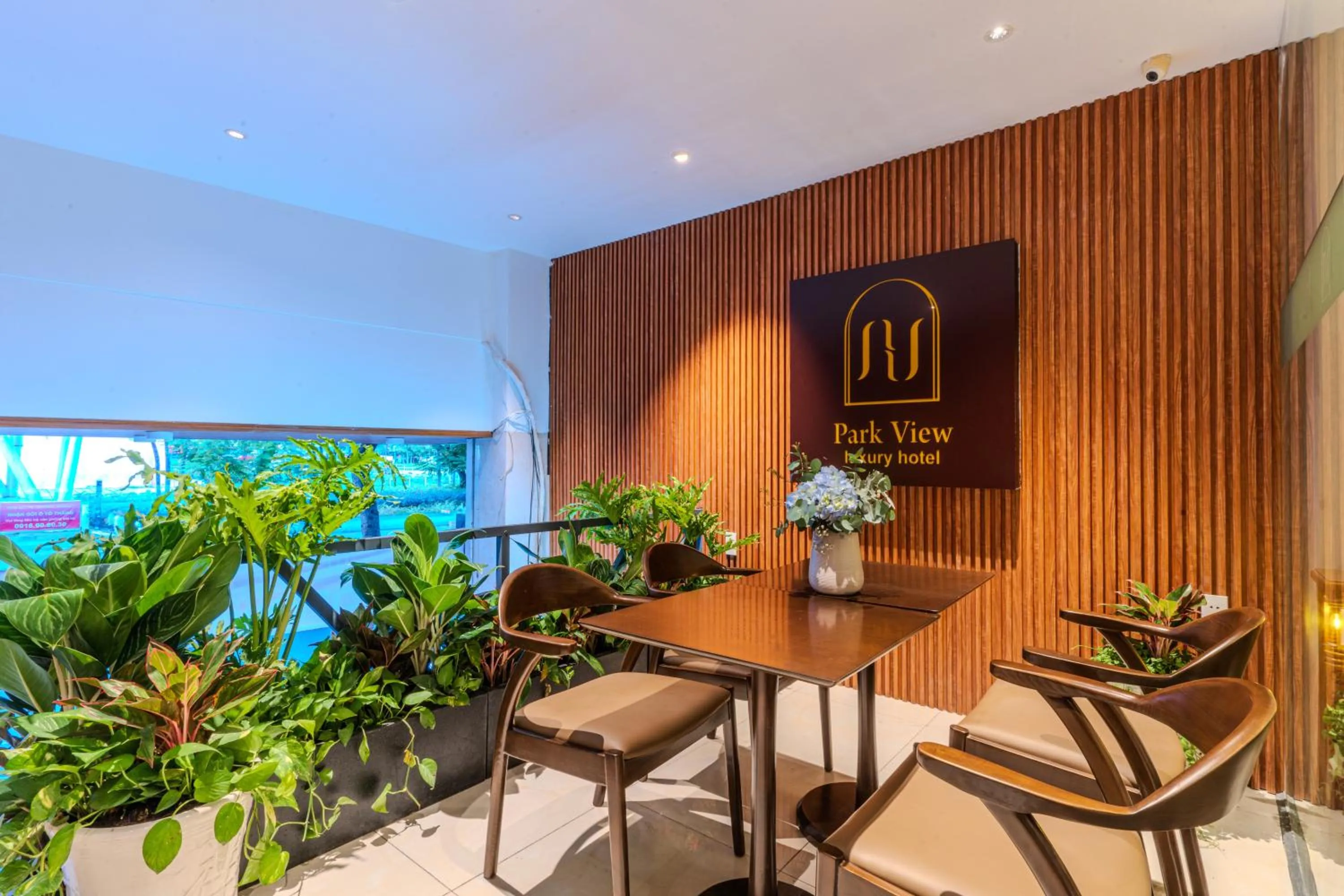 Communal lounge/ TV room in Park View Luxury Hotel