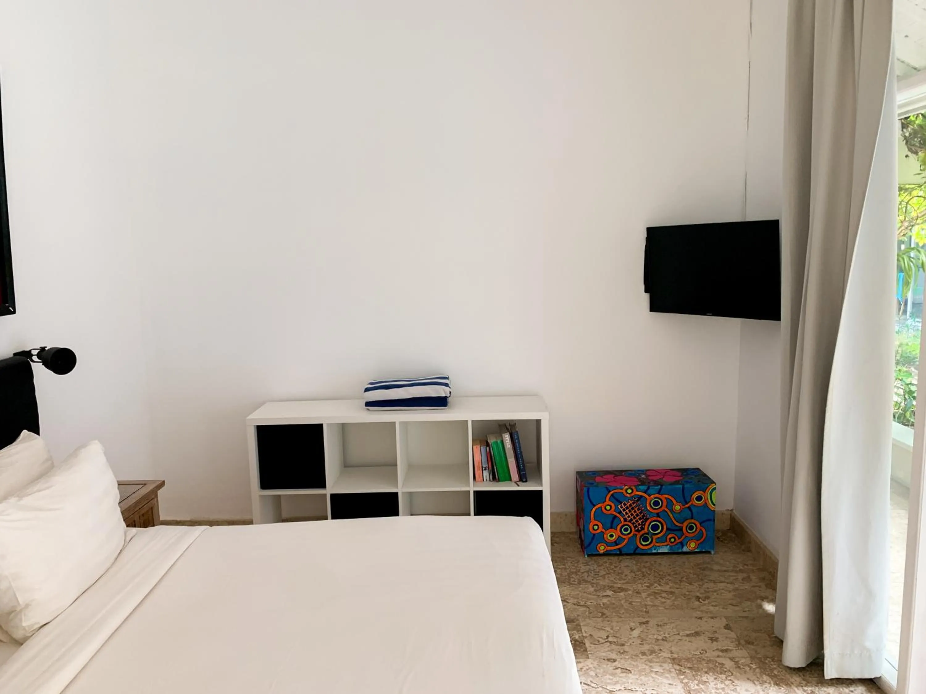 TV and multimedia, Bed in Happy Together By Kresna Hospitality