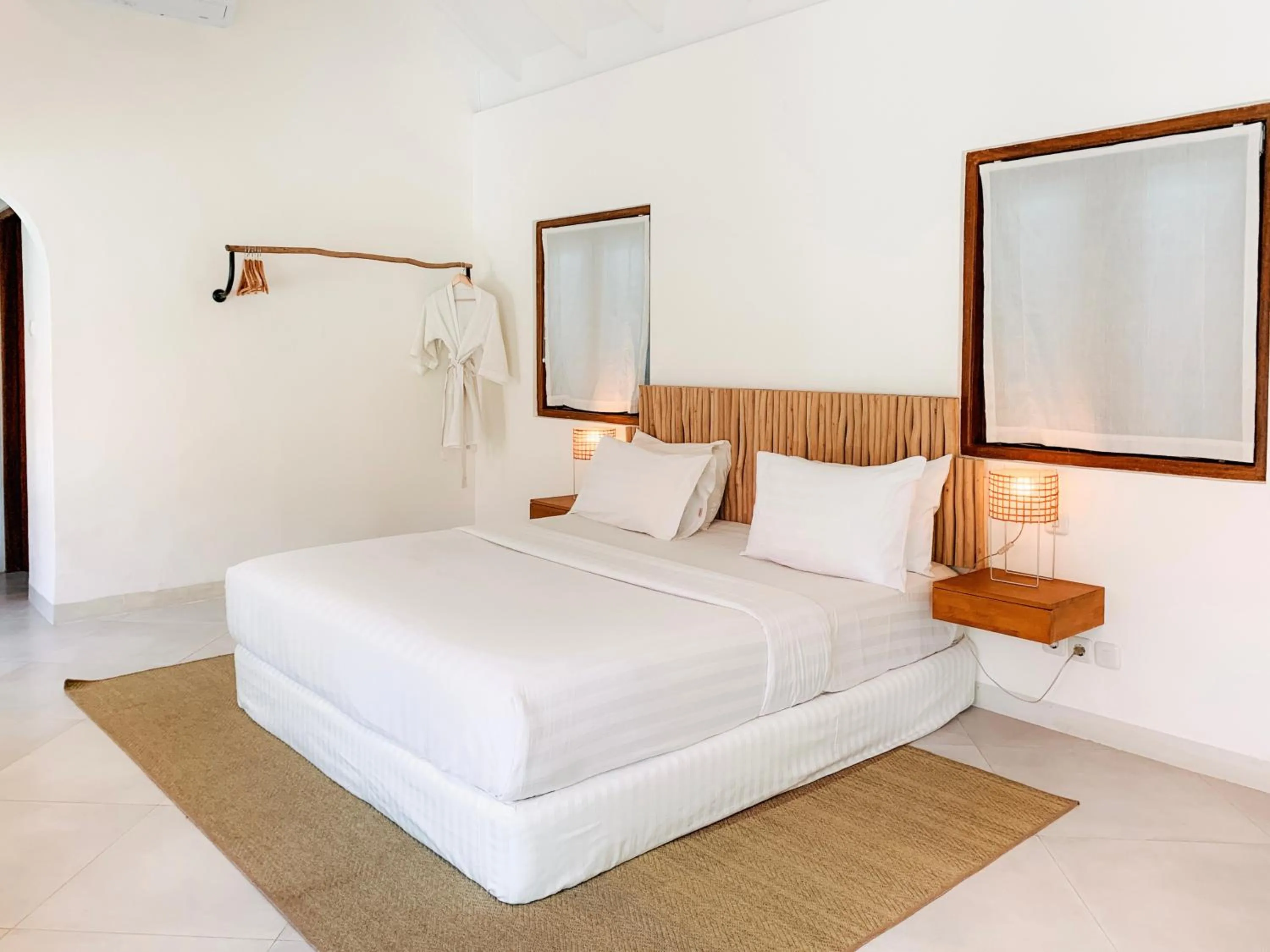 Bed in Happy Together By Kresna Hospitality