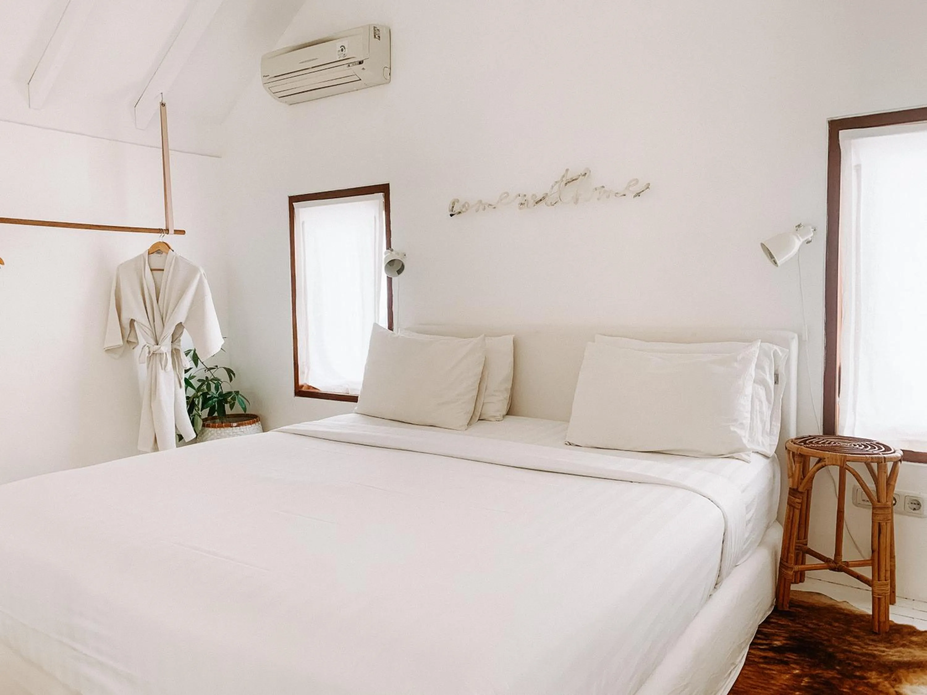 Bed in Happy Together By Kresna Hospitality