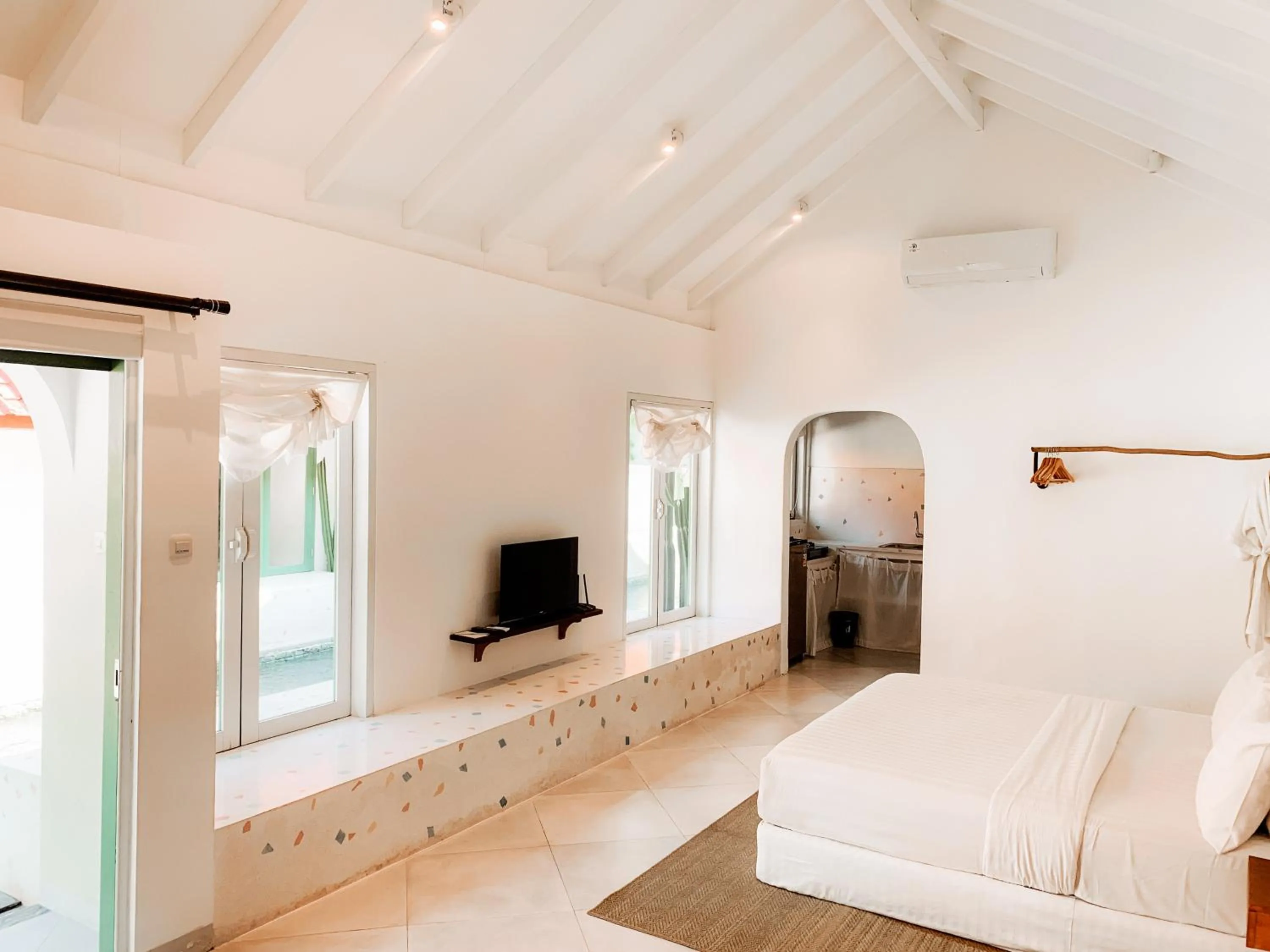 Bed in Happy Together By Kresna Hospitality