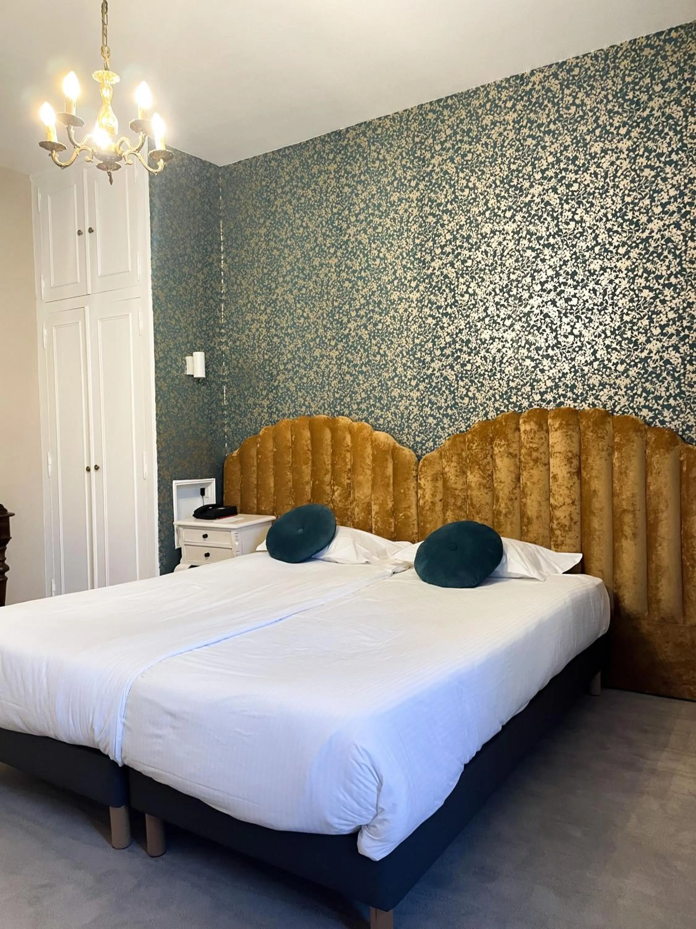 Bed in Hotel The Originals Château de Perigny