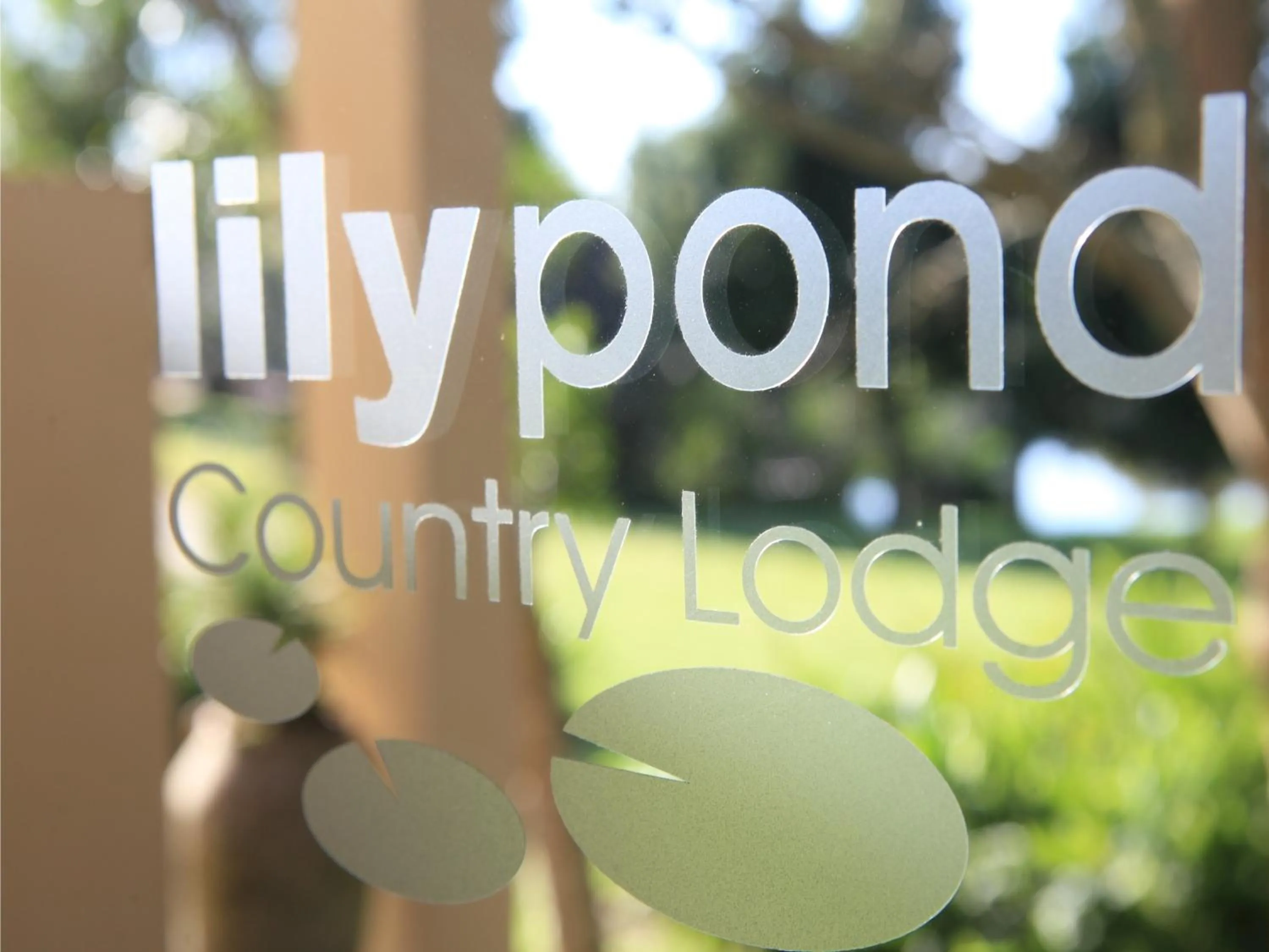 Property logo or sign in Lily Pond Country Lodge