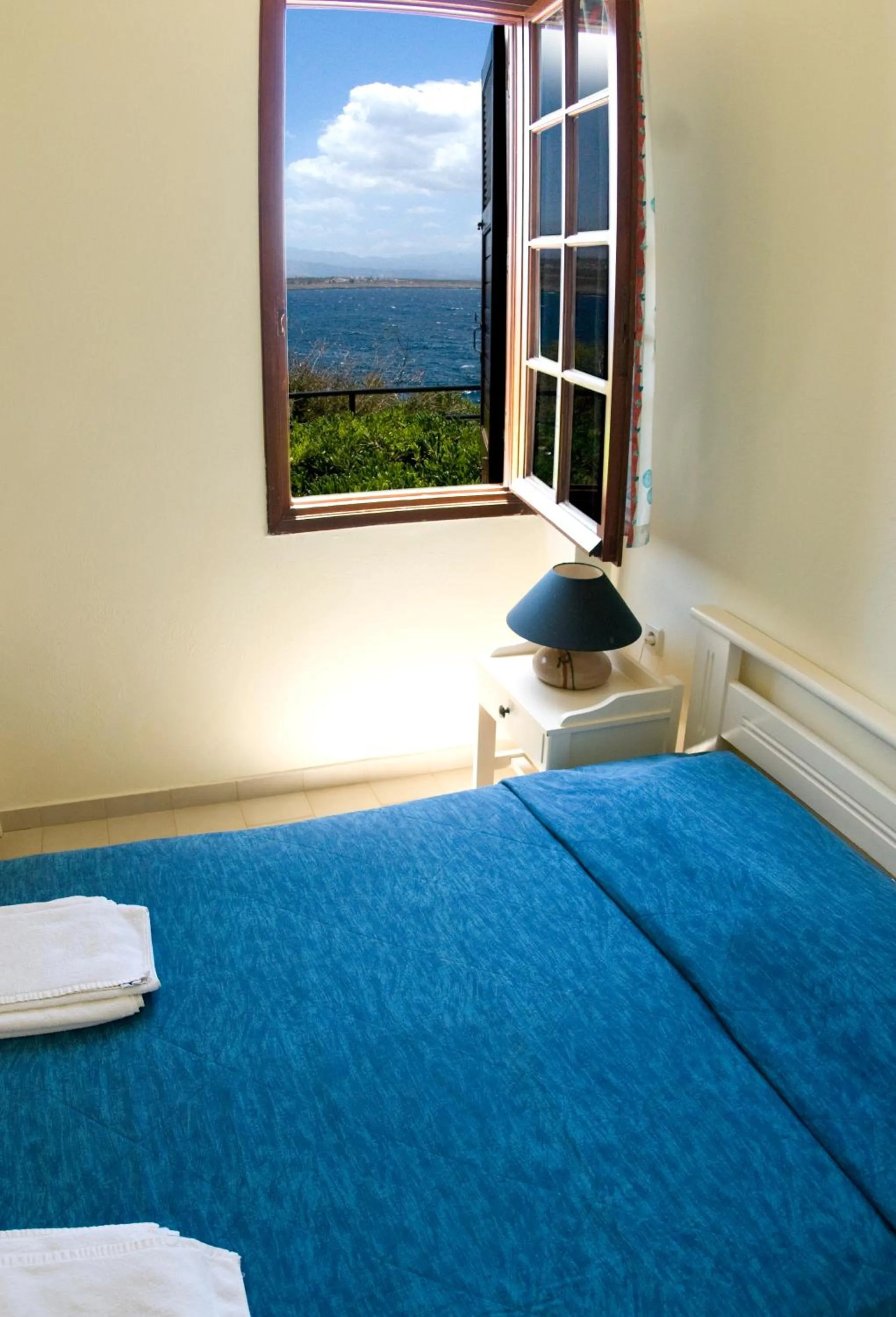 Bed in Alianthos Suites