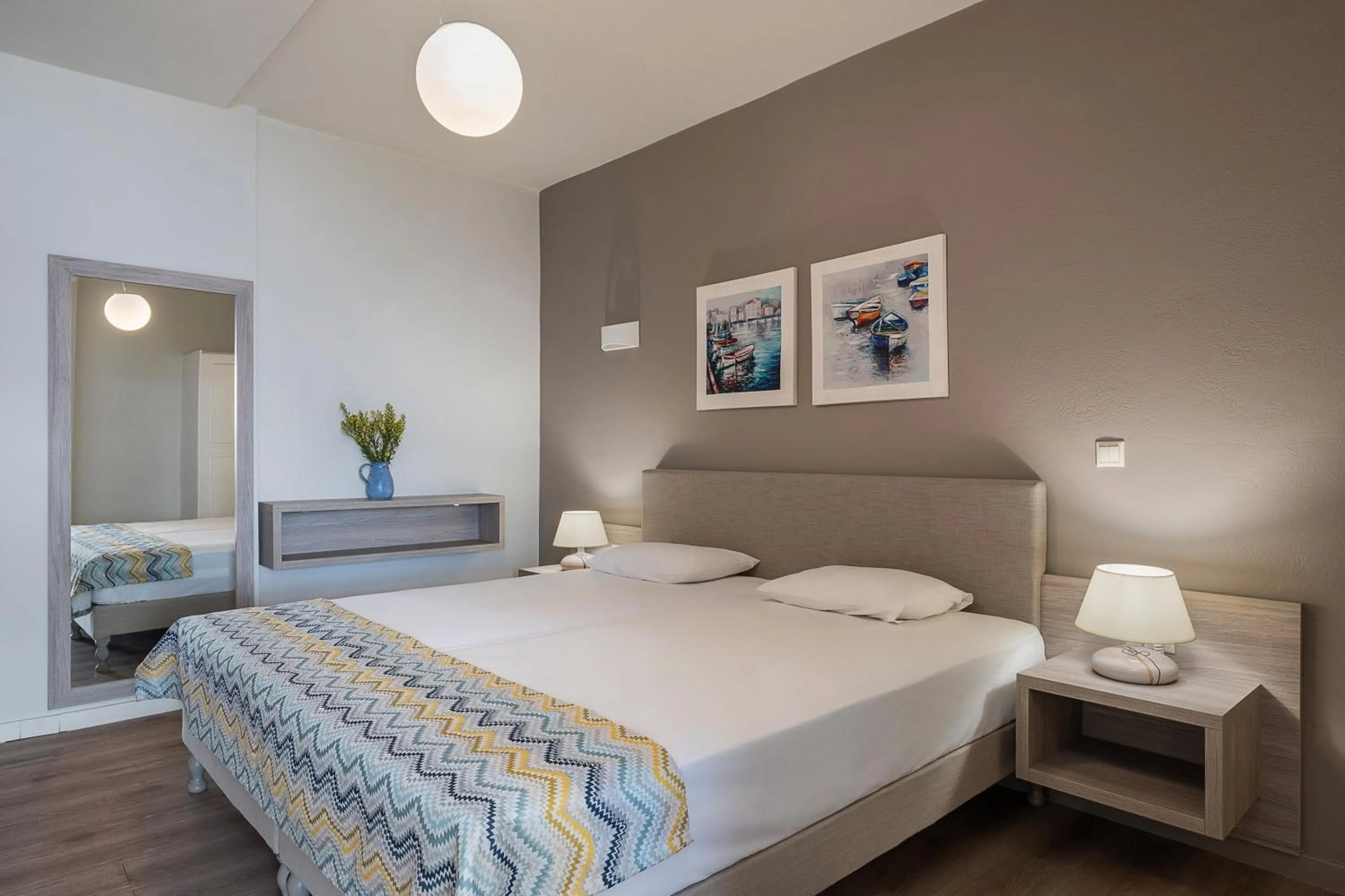 Bed in Alianthos Suites