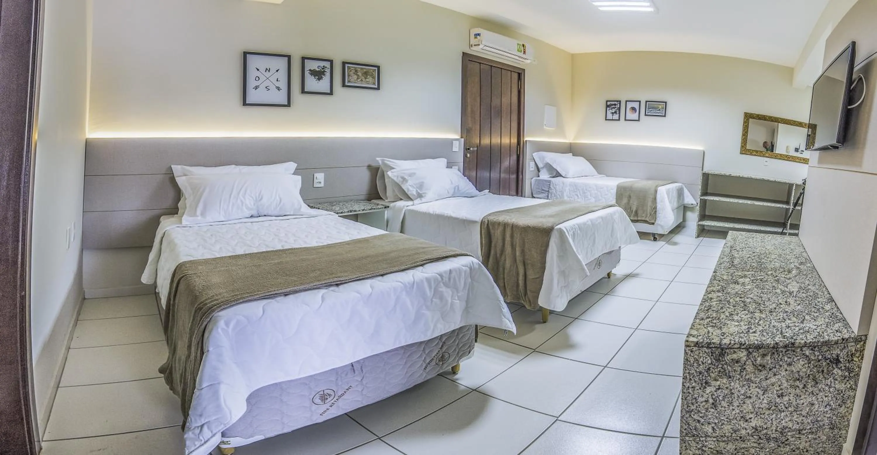 Bed in Pousada Doluar