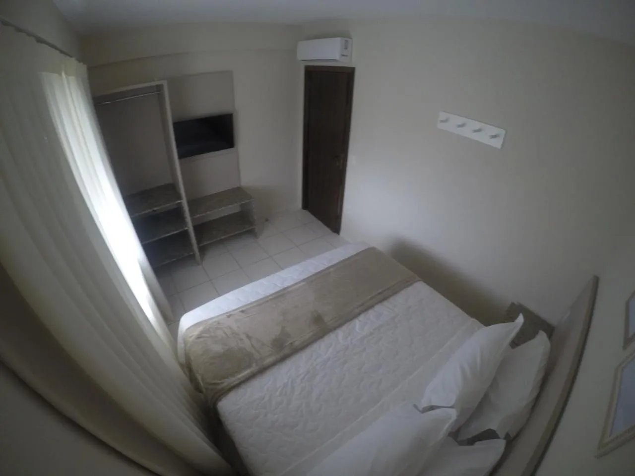 Bed in Pousada Doluar