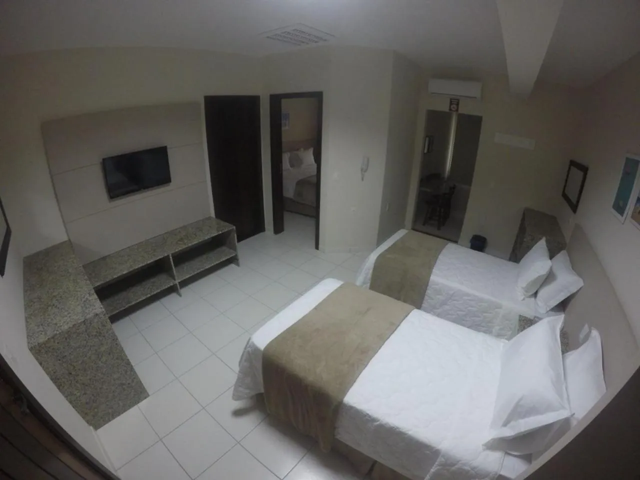 Bed in Pousada Doluar