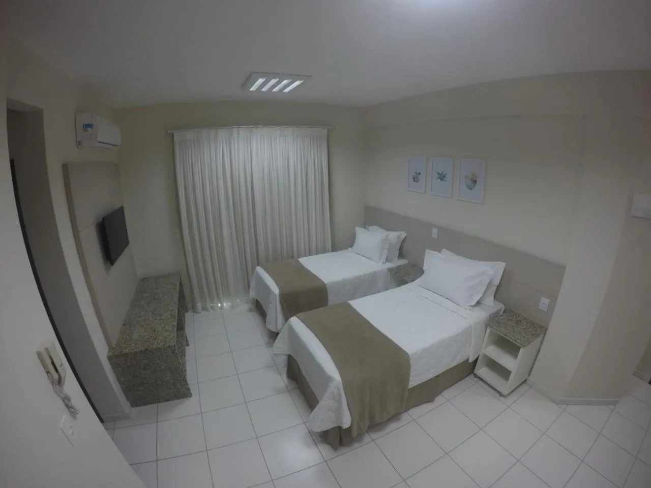 Bed in Pousada Doluar