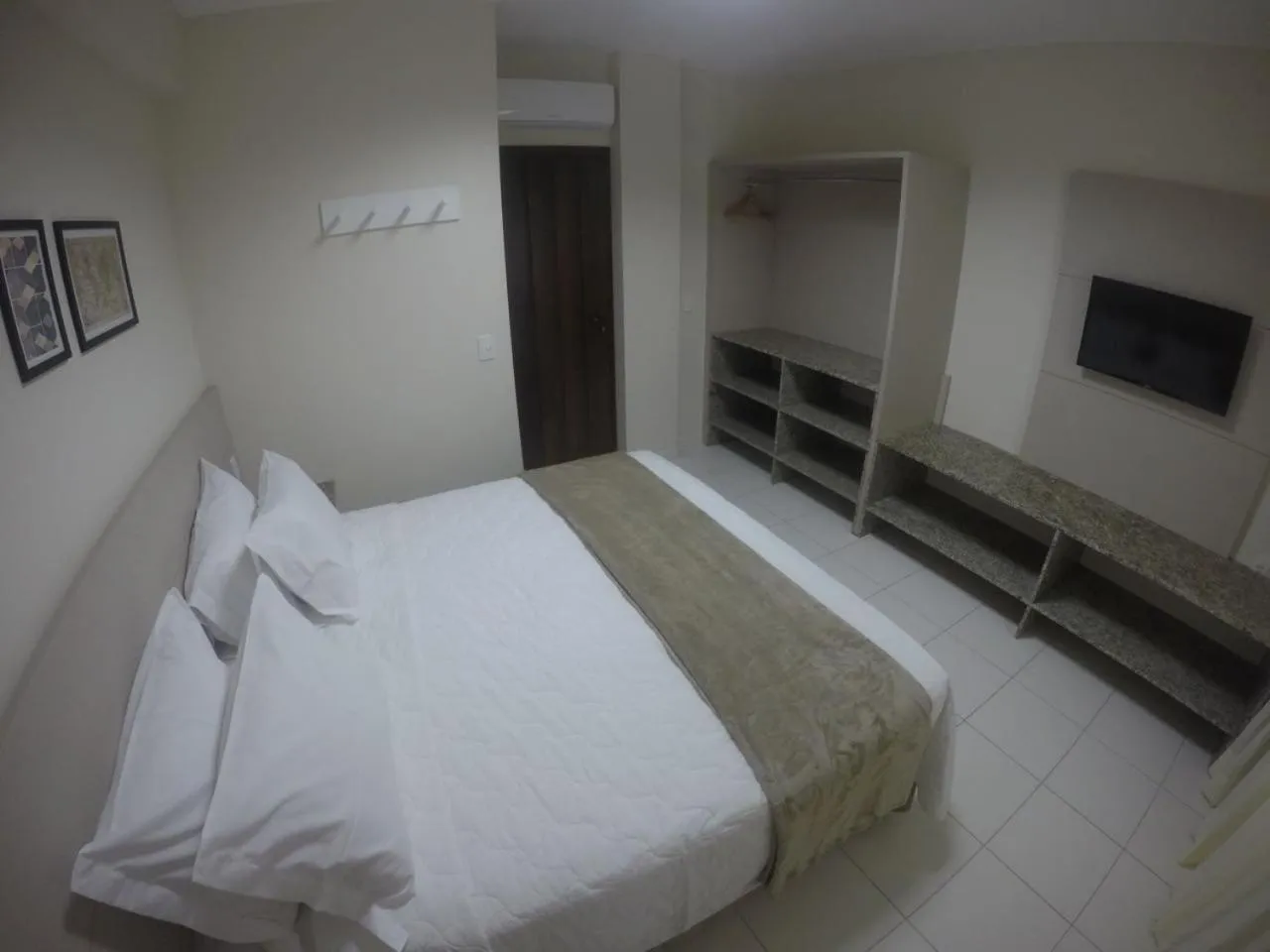 Bed in Pousada Doluar